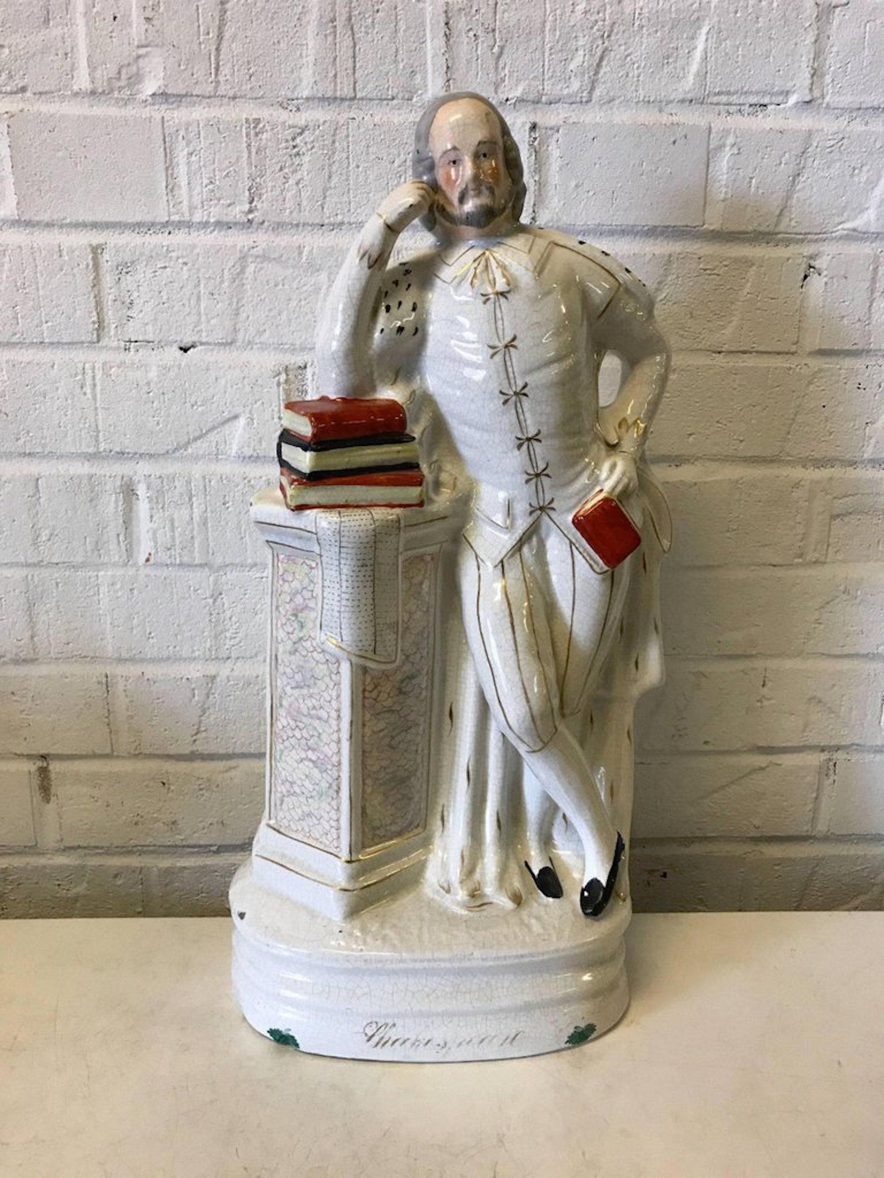 19th century Staffordshire portrait figure of Shakespeare
A similar statue was recently sold at the Sotheby's auction (9/26/17) collection of Vivien Leigh (item #79), photographed in situ at Notley Abbey in the drawing room, circa 1959 and
