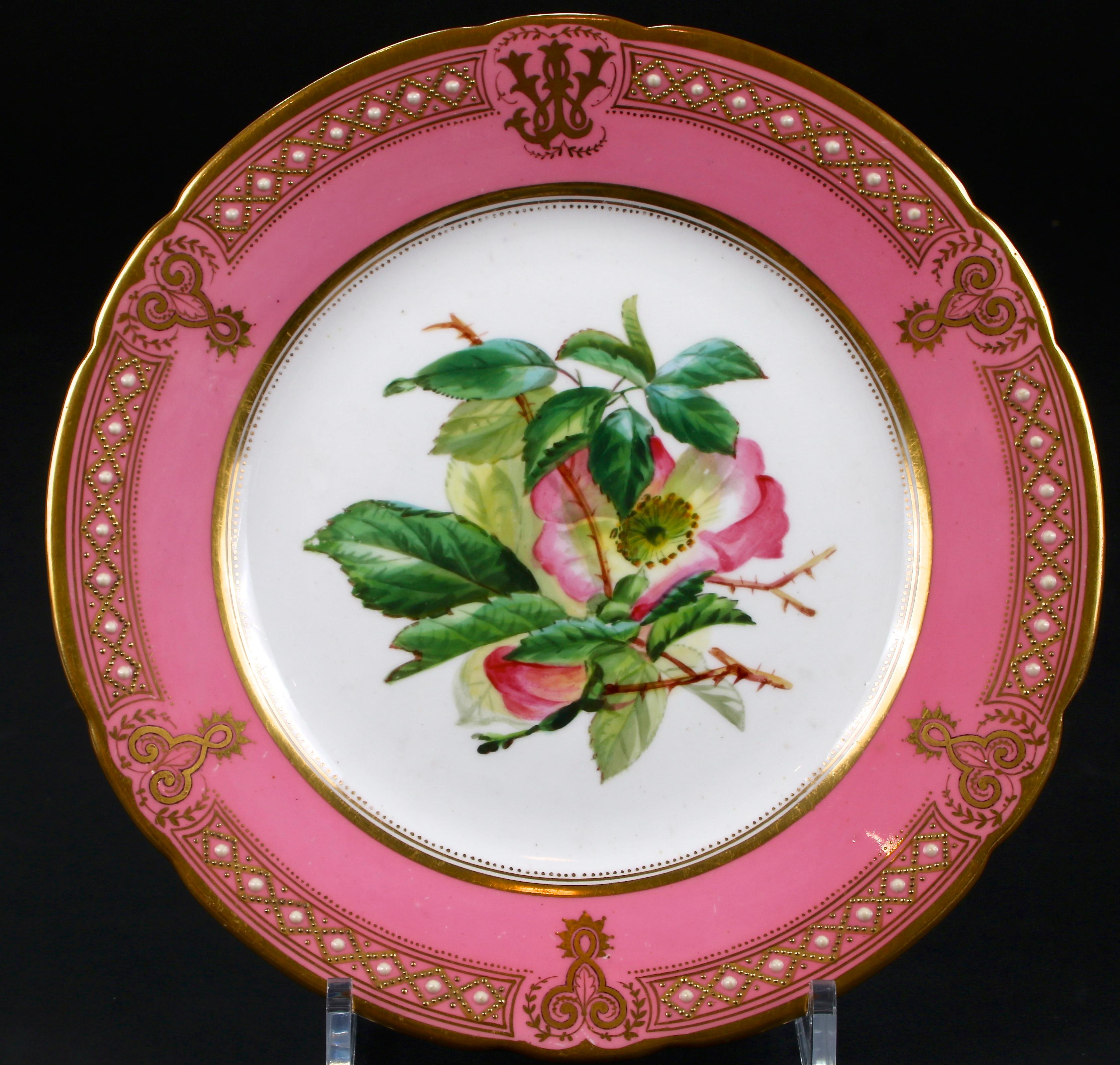 19th century hand painted, custom made pink, ‘Rose Pompadour’ dessert service from R.G. Scrivener & Co. England., 21 pieces total. No manufacturer's name but we would guess that this service was made by Davenport. Each piece has been skilfully hand