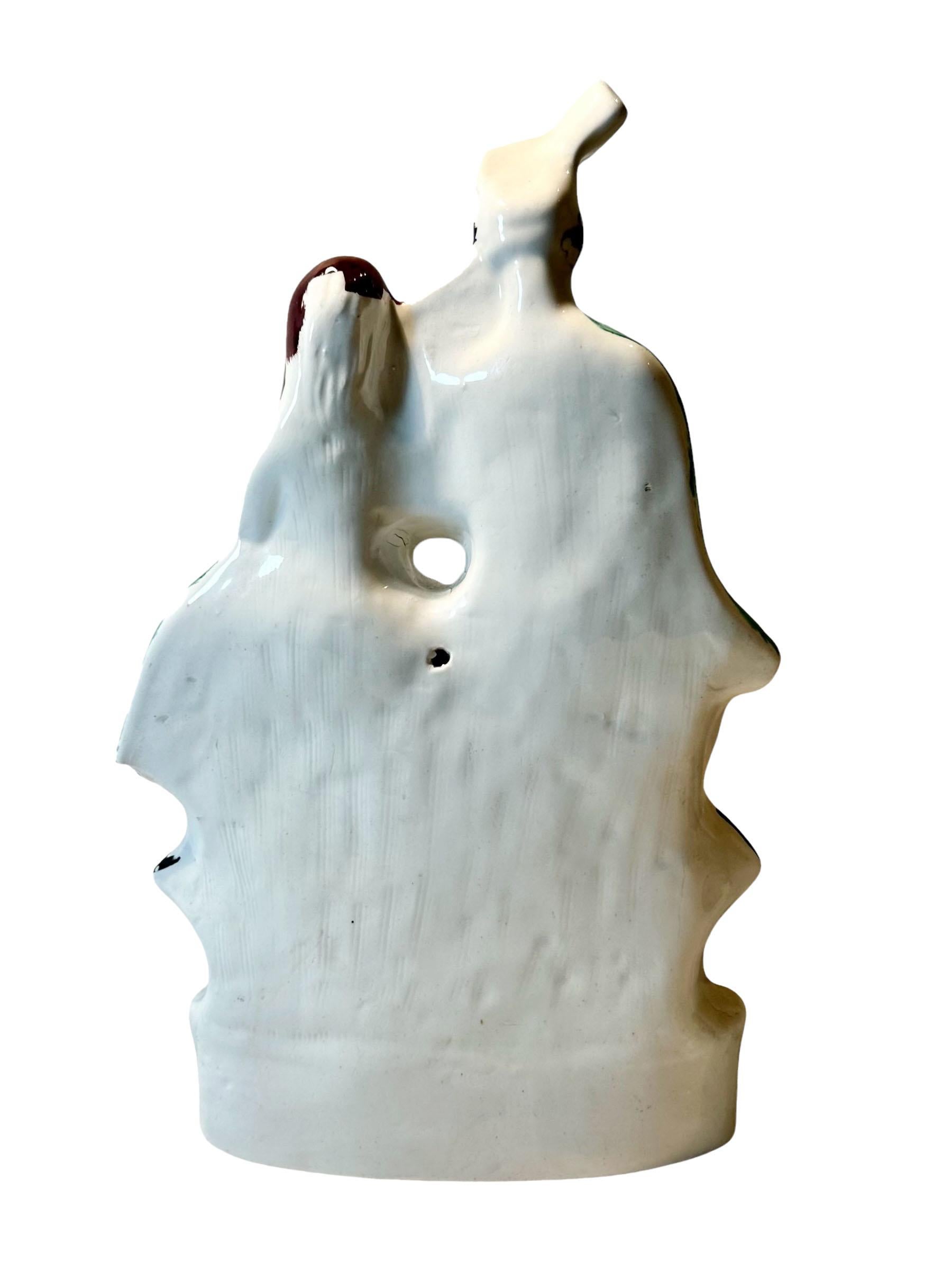 Figurina di uomo e ragazza scozzese dello Staffordshire del XIX secolo In condizioni buone in vendita a Tampa, FL
