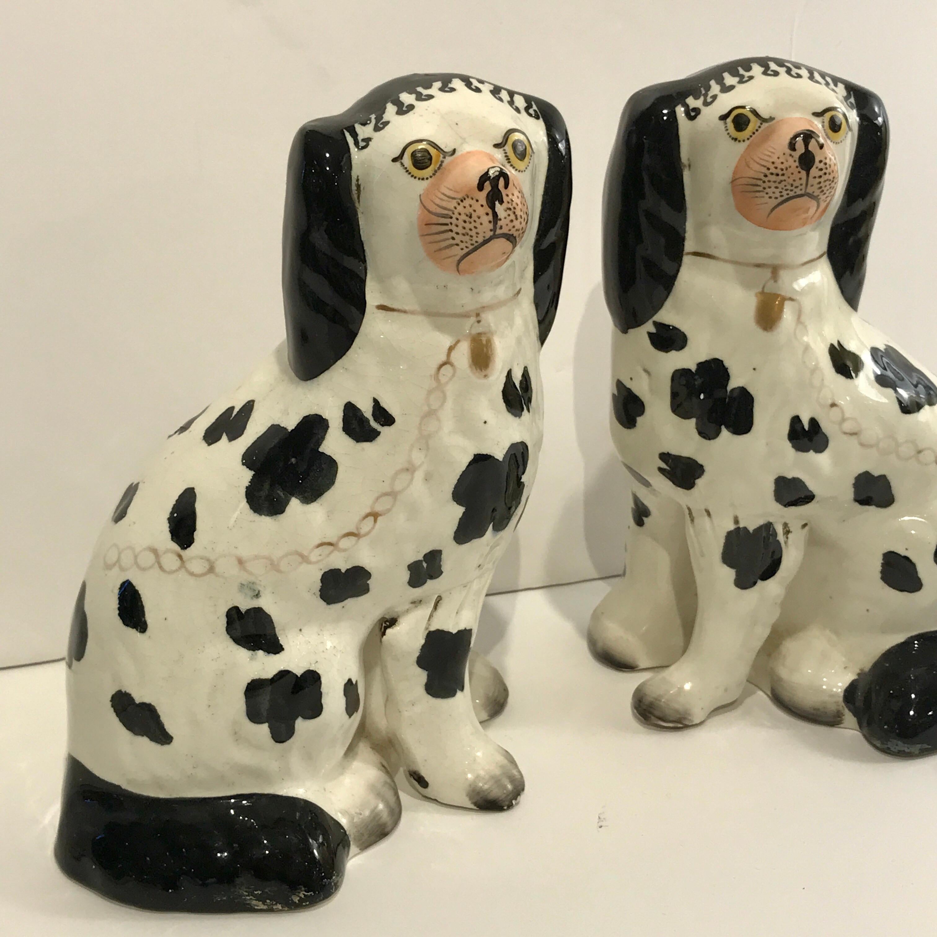 High Victorian 19th Century Staffordshire Seated Disraeli Black and White Spaniel Dogs