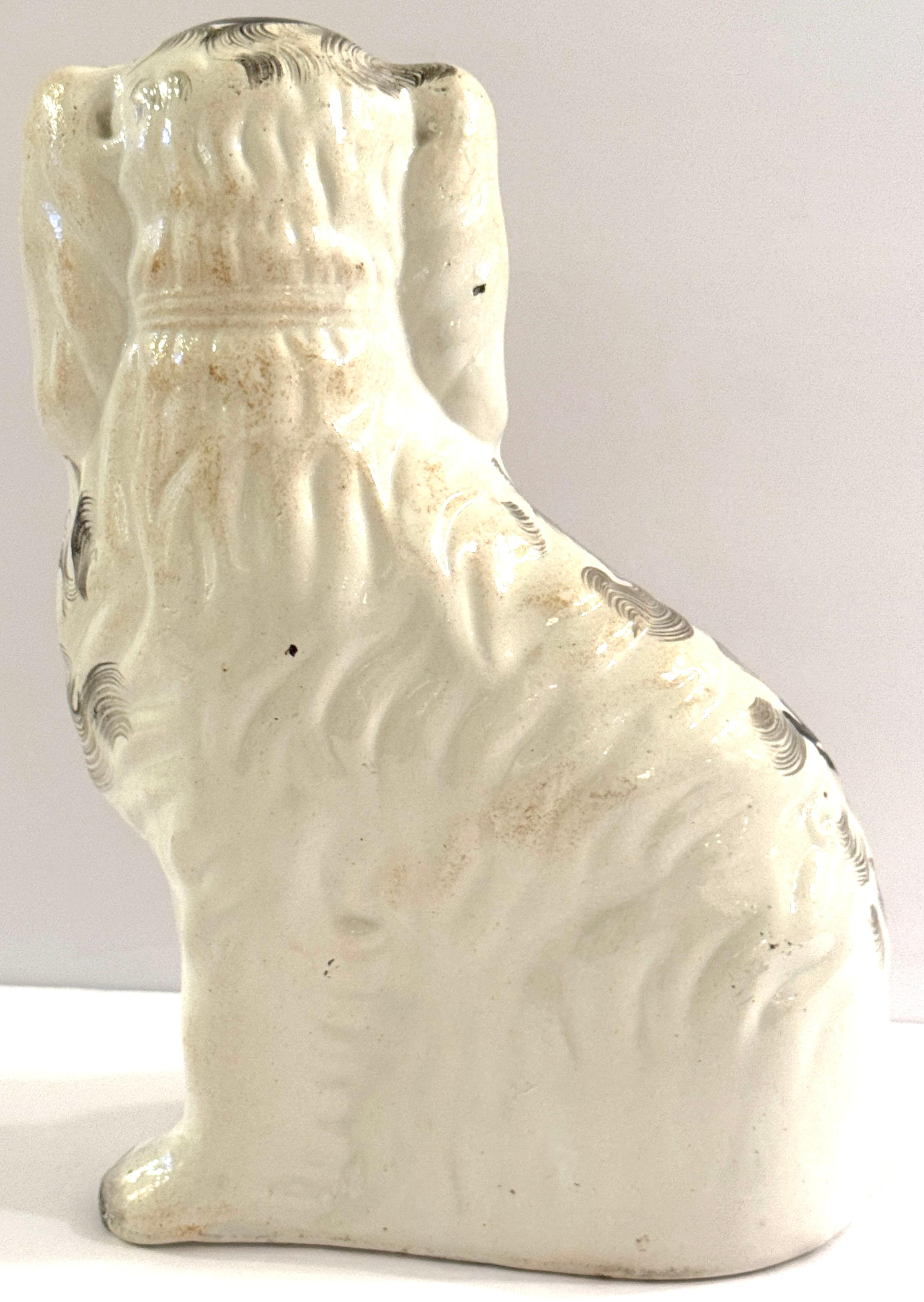 19th Century Staffordshire Unique Black & White Spaniel with Separated Foot For Sale 3