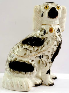 19th Century Staffordshire Unique Black & White Spaniel with Separated Foot
