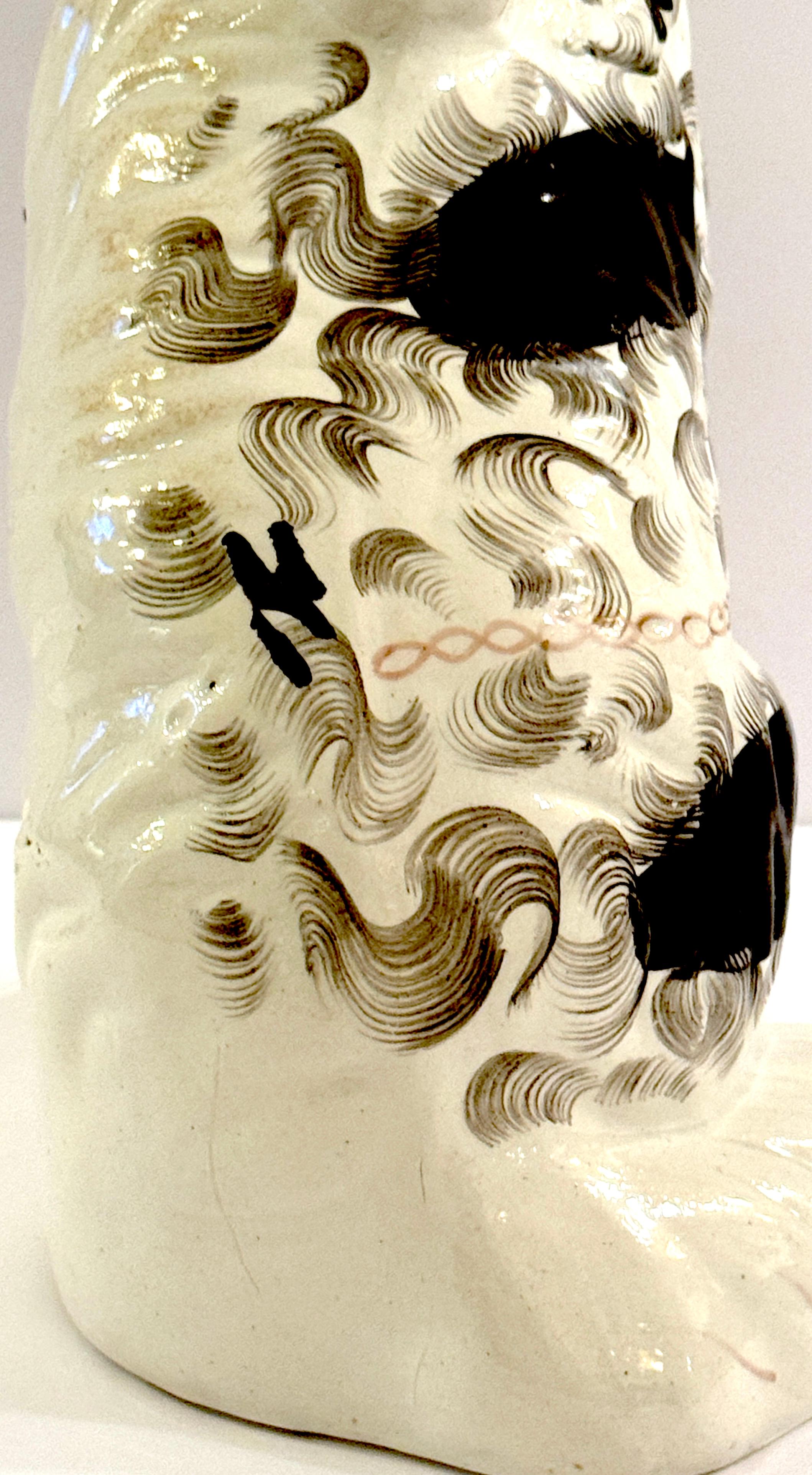 19th Century Staffordshire Unique Black & White Spaniel with Separated Foot For Sale 1
