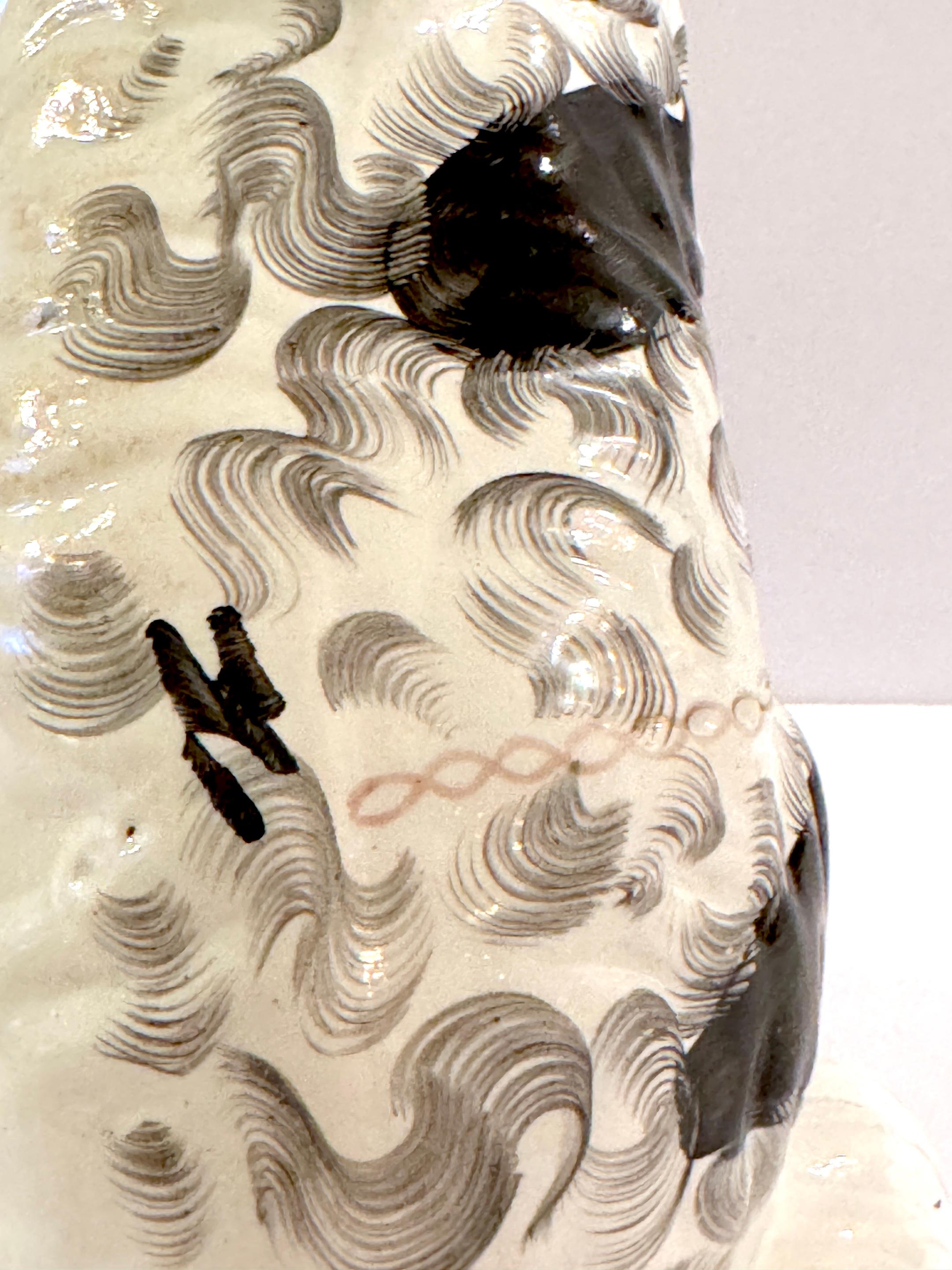 19th Century Staffordshire Unique Black & White Spaniel with Separated Foot For Sale 2