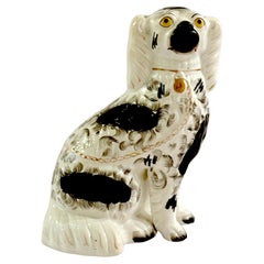 19th Century Staffordshire Unique Black & White Spaniel with Separated Foot