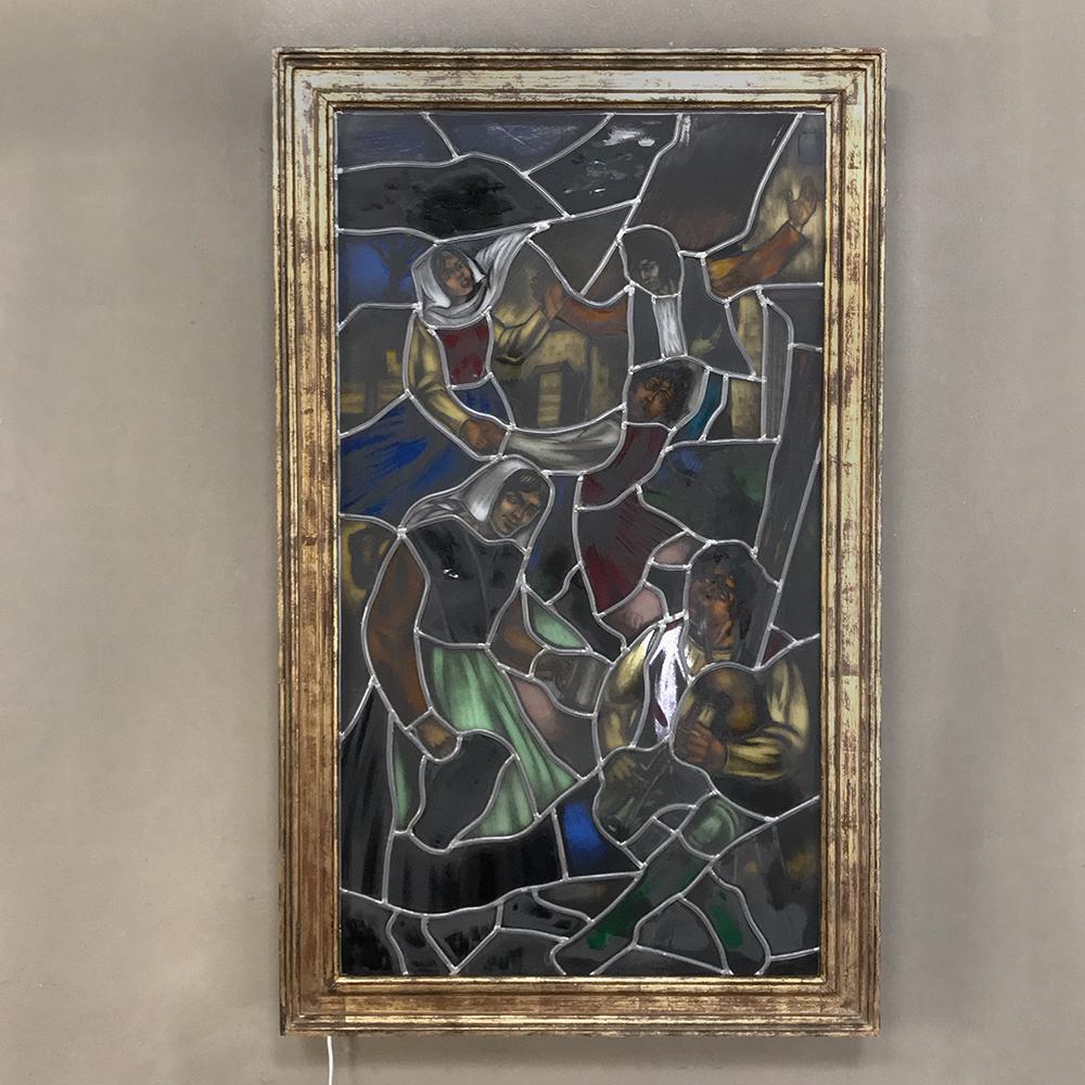 19th century stained glass window depicts a charming tavern scene involving music and dancing. Framed in a backlit shadowbox, it is great to hang on any wall, or if you prefer, the lightbox can be easily removed and you can put it in front of a