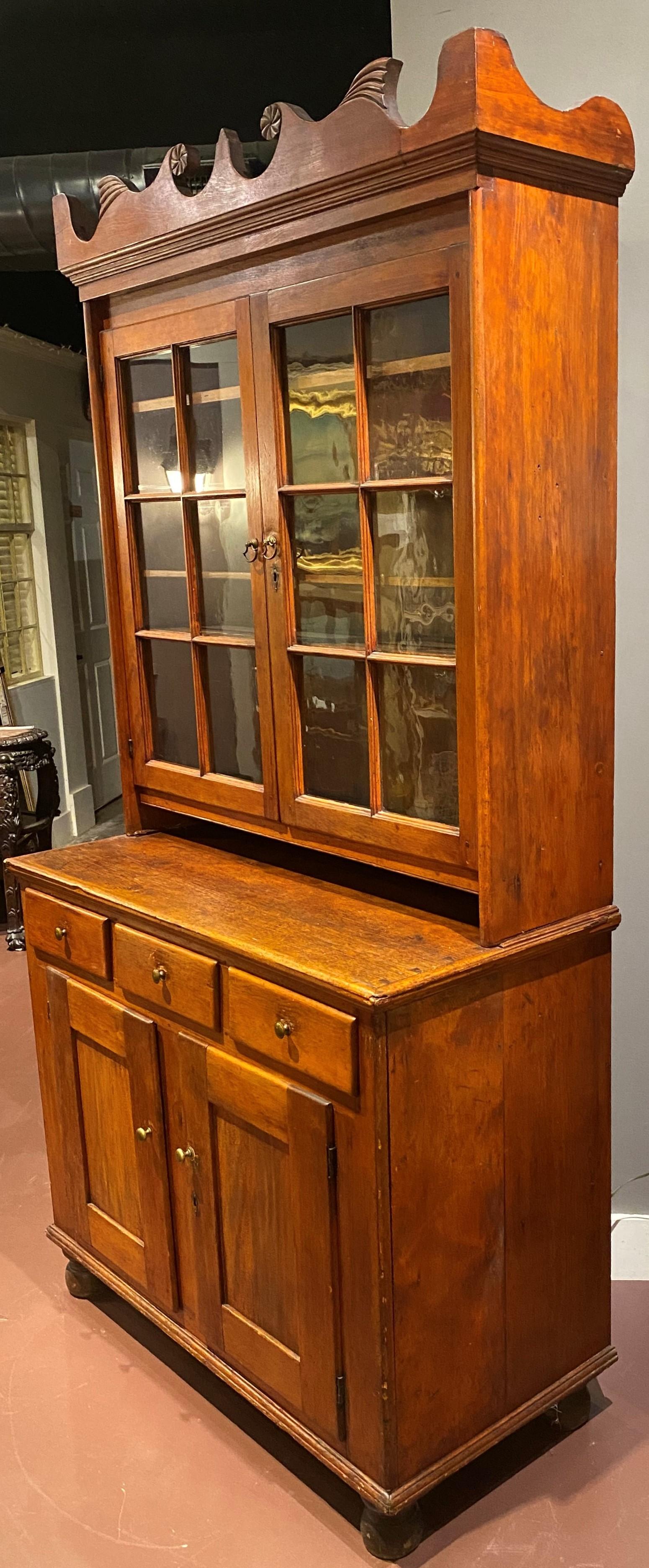 American 19th Century Stepback Cupboard with Glazed Doors & Unusual Carved Cornice