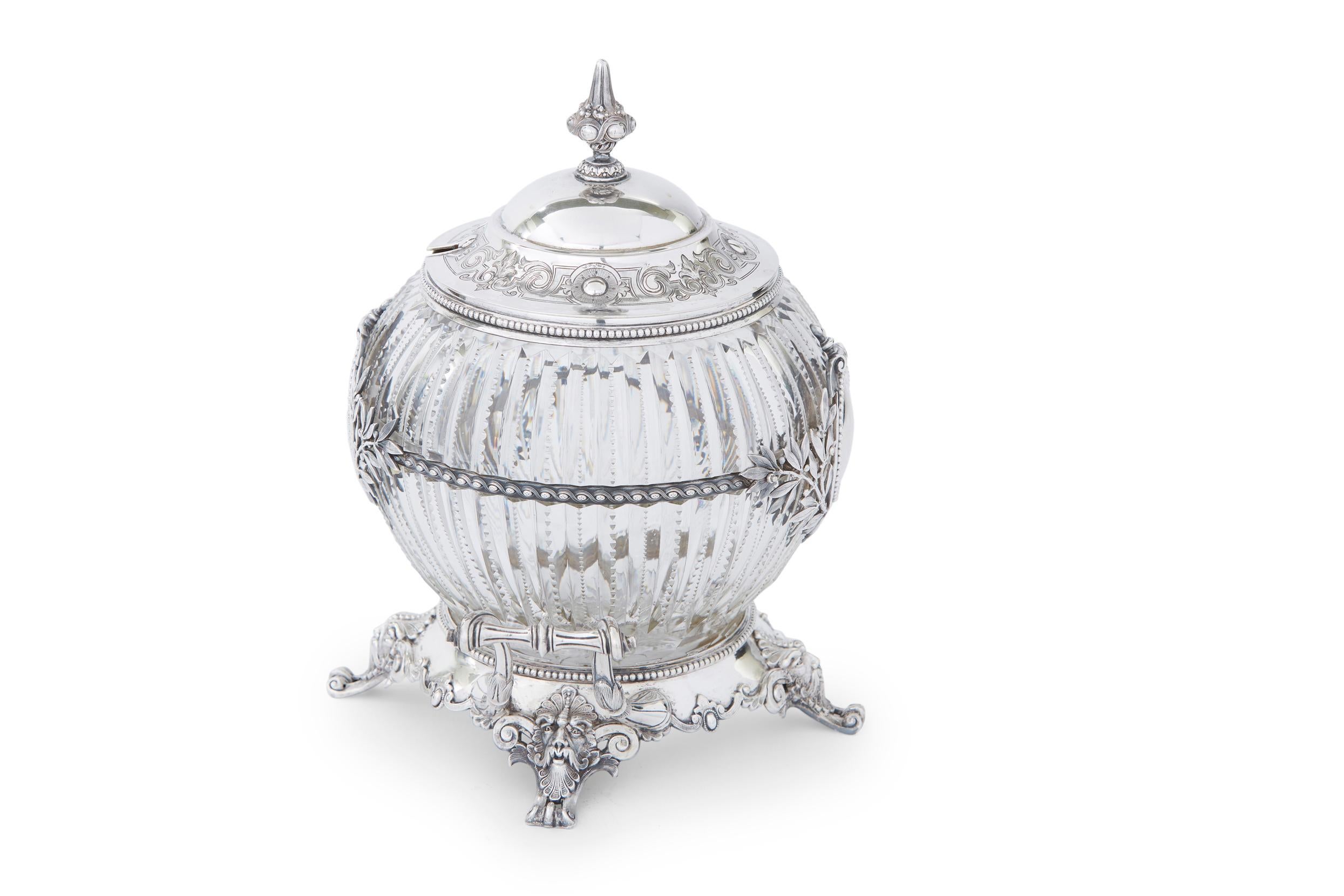 Early 19th century mounted sterling silver framed with beveled etched cut crystal barware / tableware footed server with side handles and exterior design details. The covered top featuring a gold wash interior with exterior design details. The piece