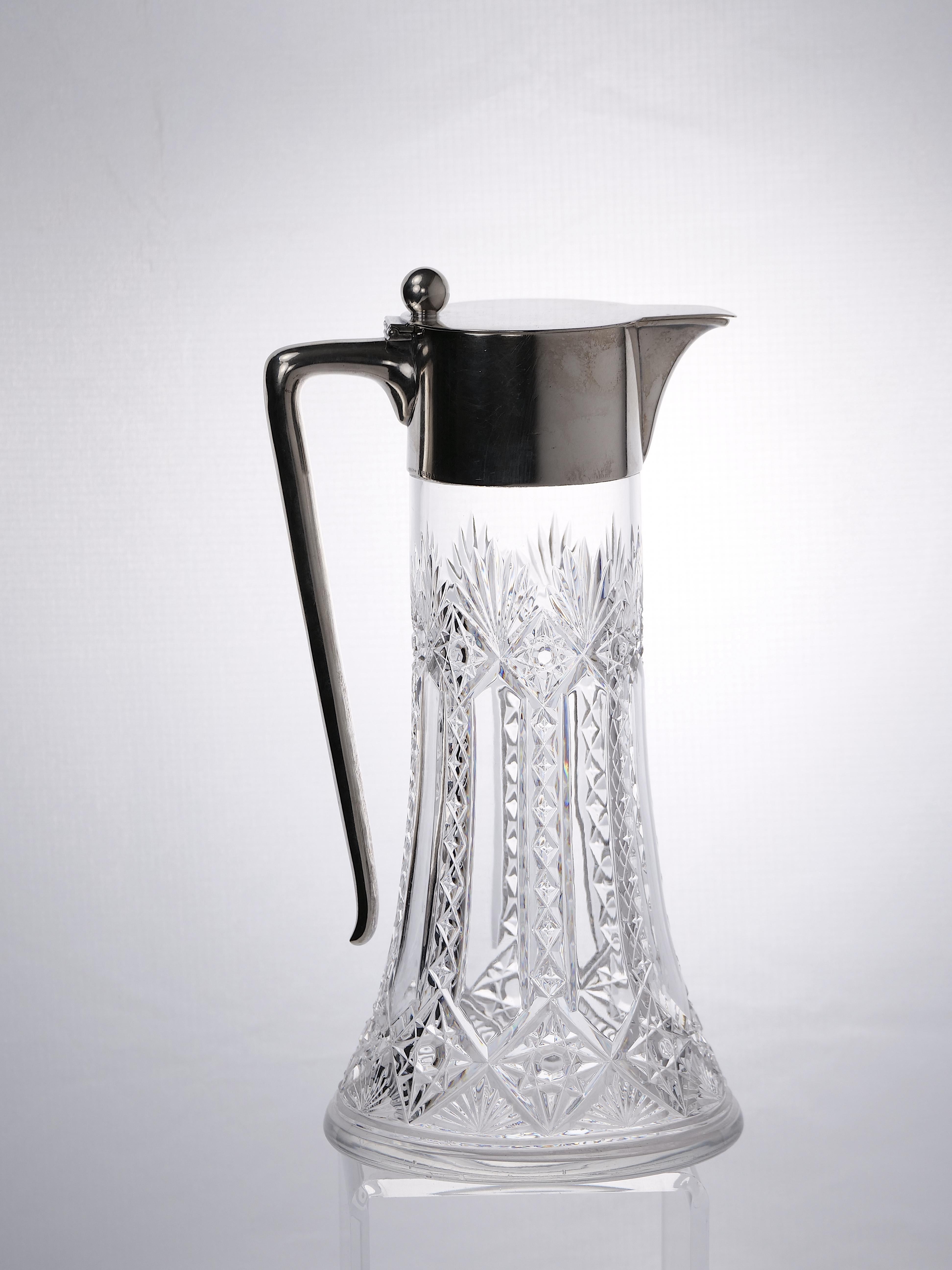 Late 19th century cut glass and sterling silver tableware / barware serving claret jug. The pitcher is hallmarked by an unknown maker, but clearly originated from Italy since it's 800 and dates to approximately the late 19th century and done in the
