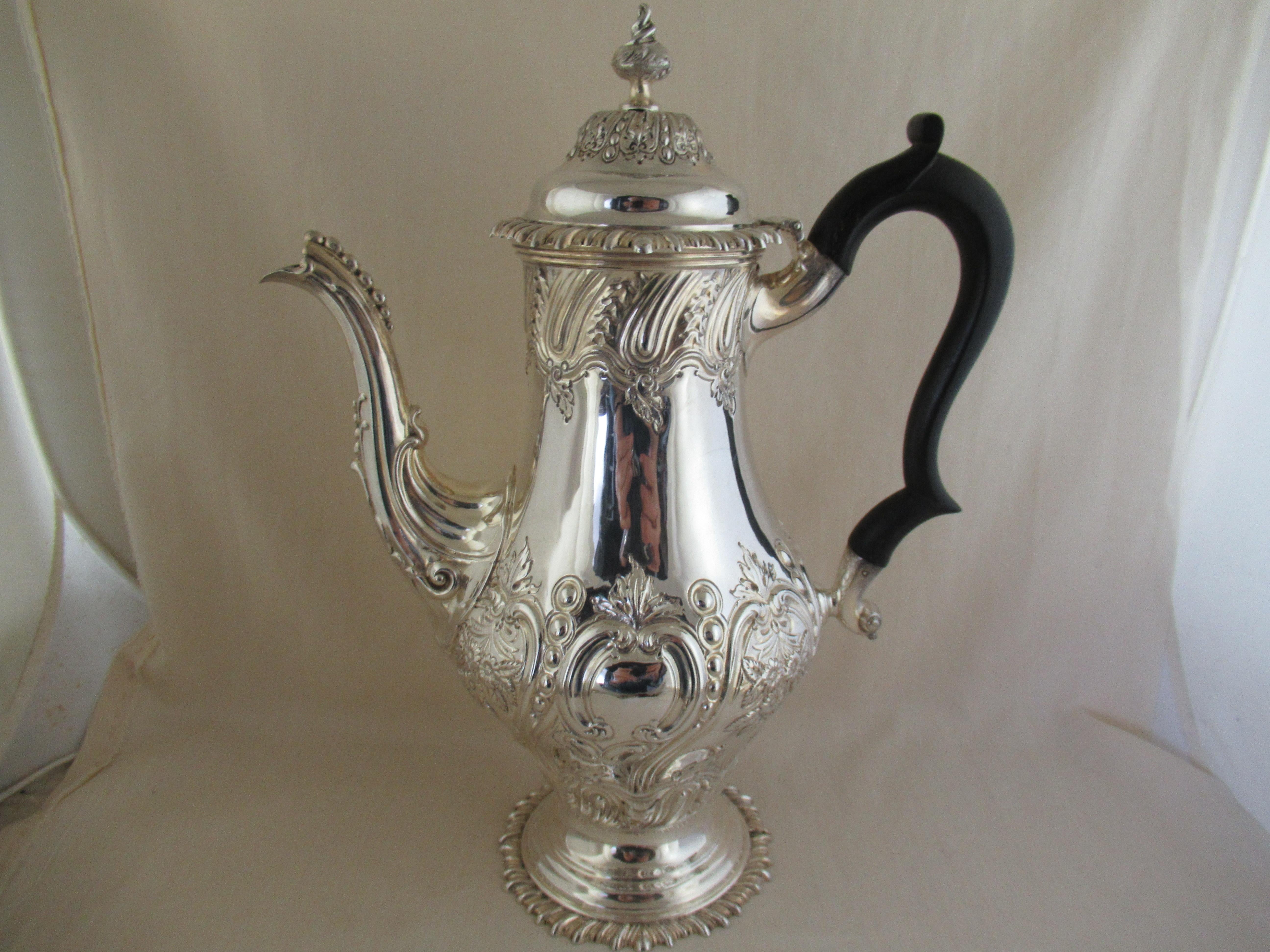 Sterling silver, large sized, baluster shaped Coffee Pot
Made in London in 1889, by Joseph & Horace Savory, trading as the Goldsmiths Alliance,
 Their showroom in Regent Street, London.
An excellent set of identifying hallmarks, to the right at