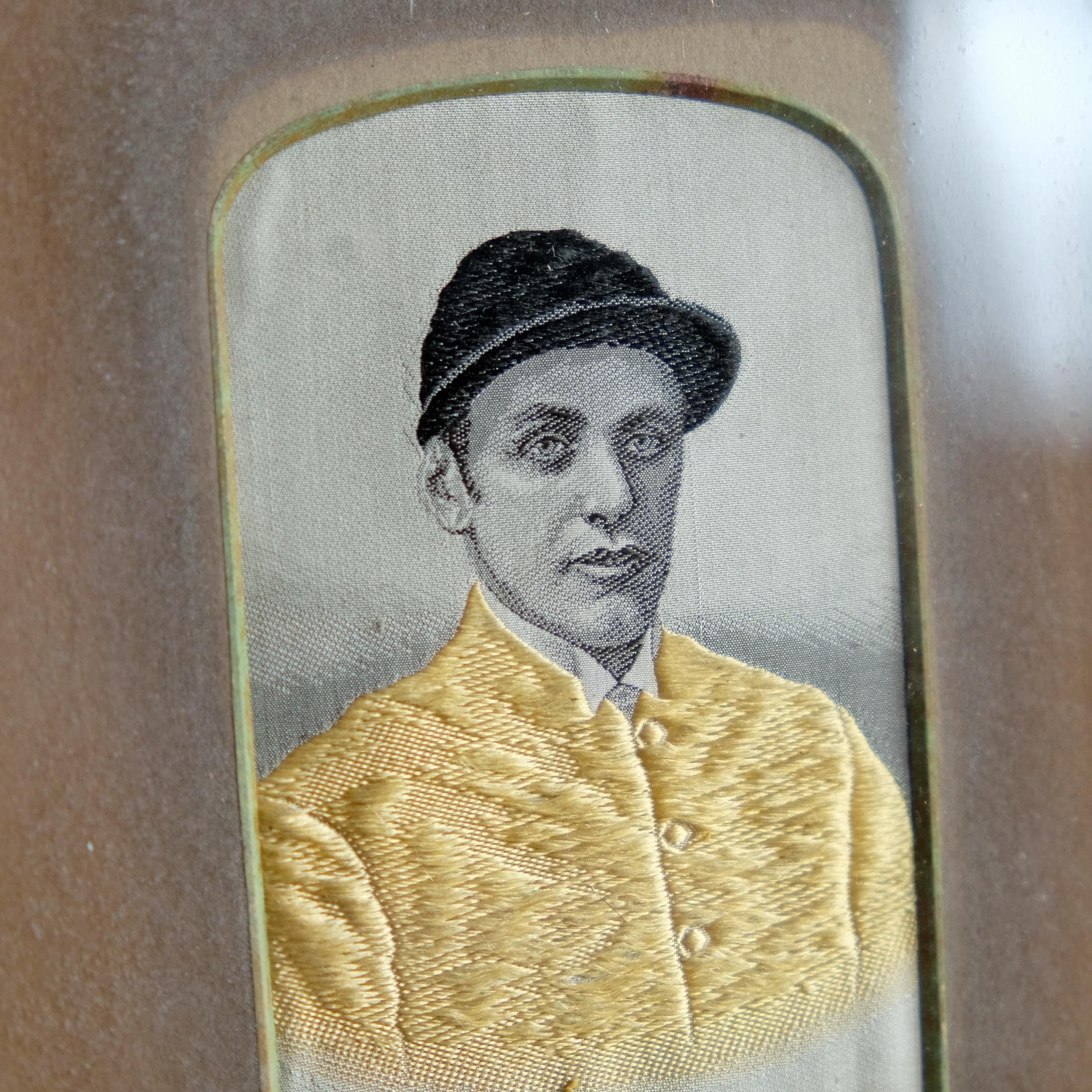 Victorian stevengraph of 19th century jockey, Fred Archer wearing solid yellow which is was the King’s colors.
Originated by Thomas Stevens around 1862, a stevengraph is simply a picture made from woven silk. The image is drawn or printed onto a