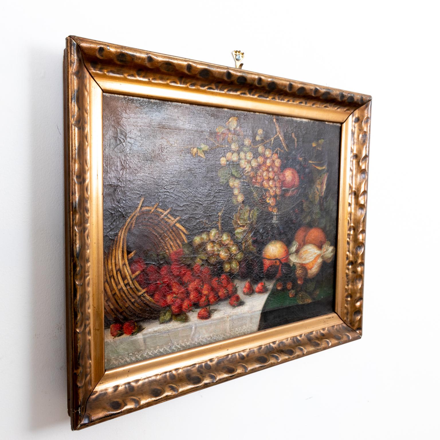 Circa 19th century still life of strawberries, peaches, grapes and other fruits in a period frame. The piece is in the medium oil on canvas and signed by the artist L. Sitzunnel on the lower right. Please note of wear consistent with age.