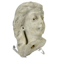 19e siècle, Fragment en pierre d'une tête de femme