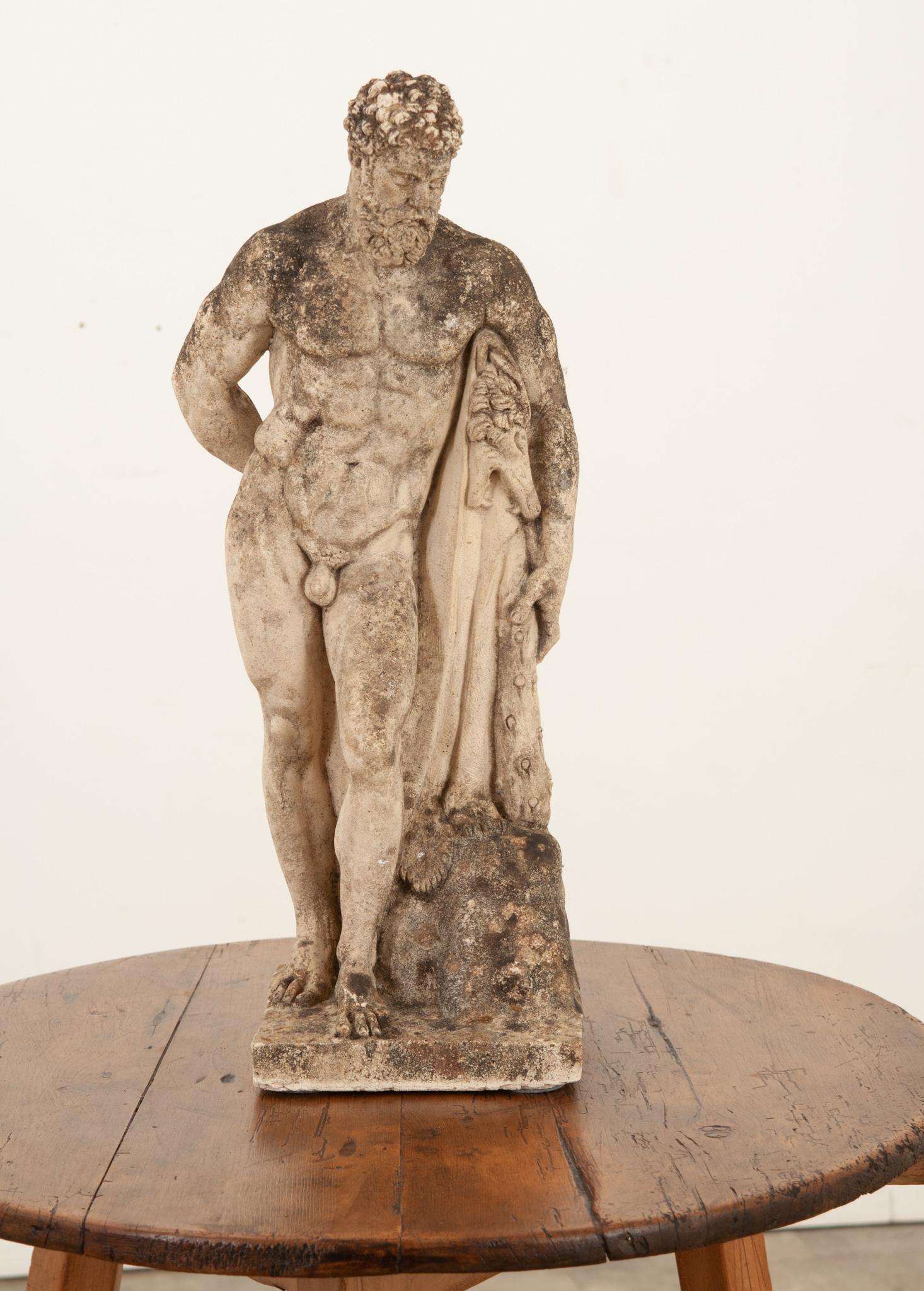 A beautifully patinated 19th century European stone statue depicting the Farnese Hercules, an ancient statue of Hercules made by Glykon in the early third century AD which is one of the most famous sculptures of antiquity. A muscular yet weary