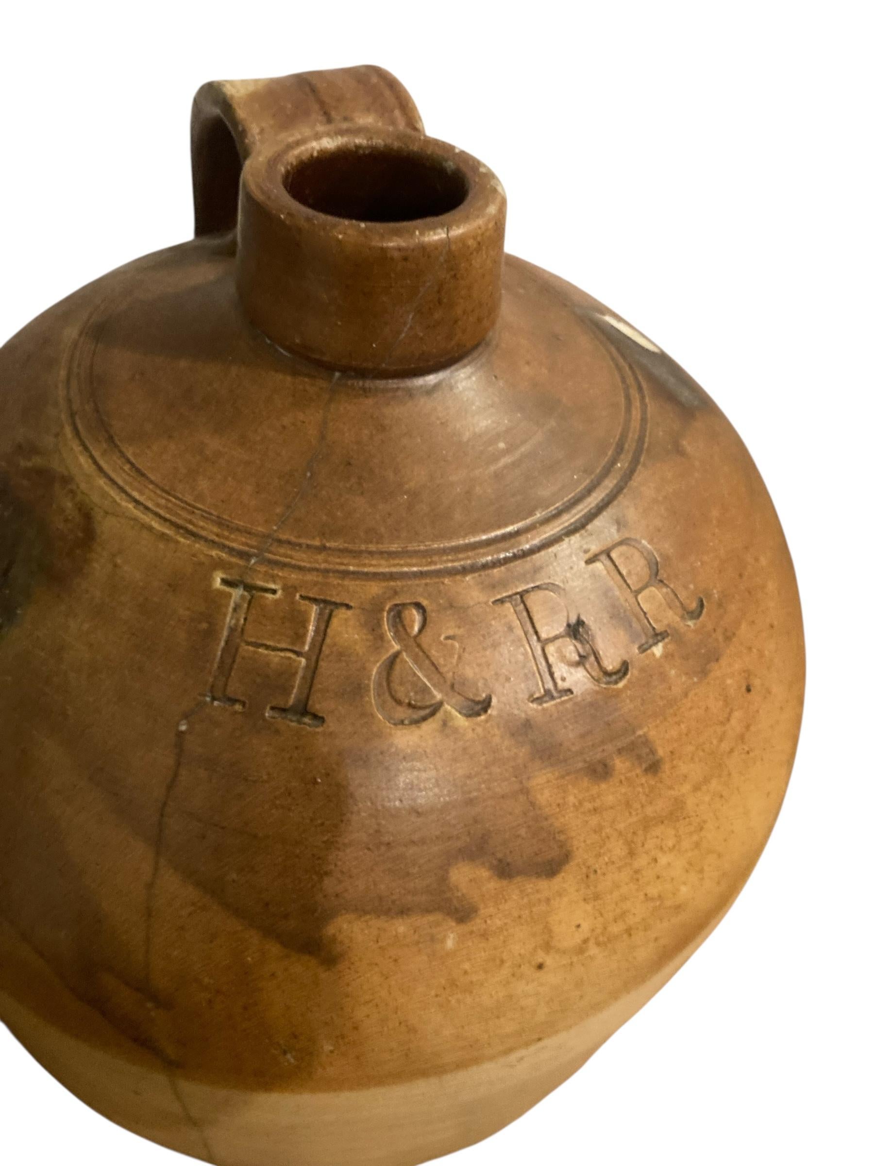 19th century stoneware salt glazed flagons stamped H & RR For Sale 1