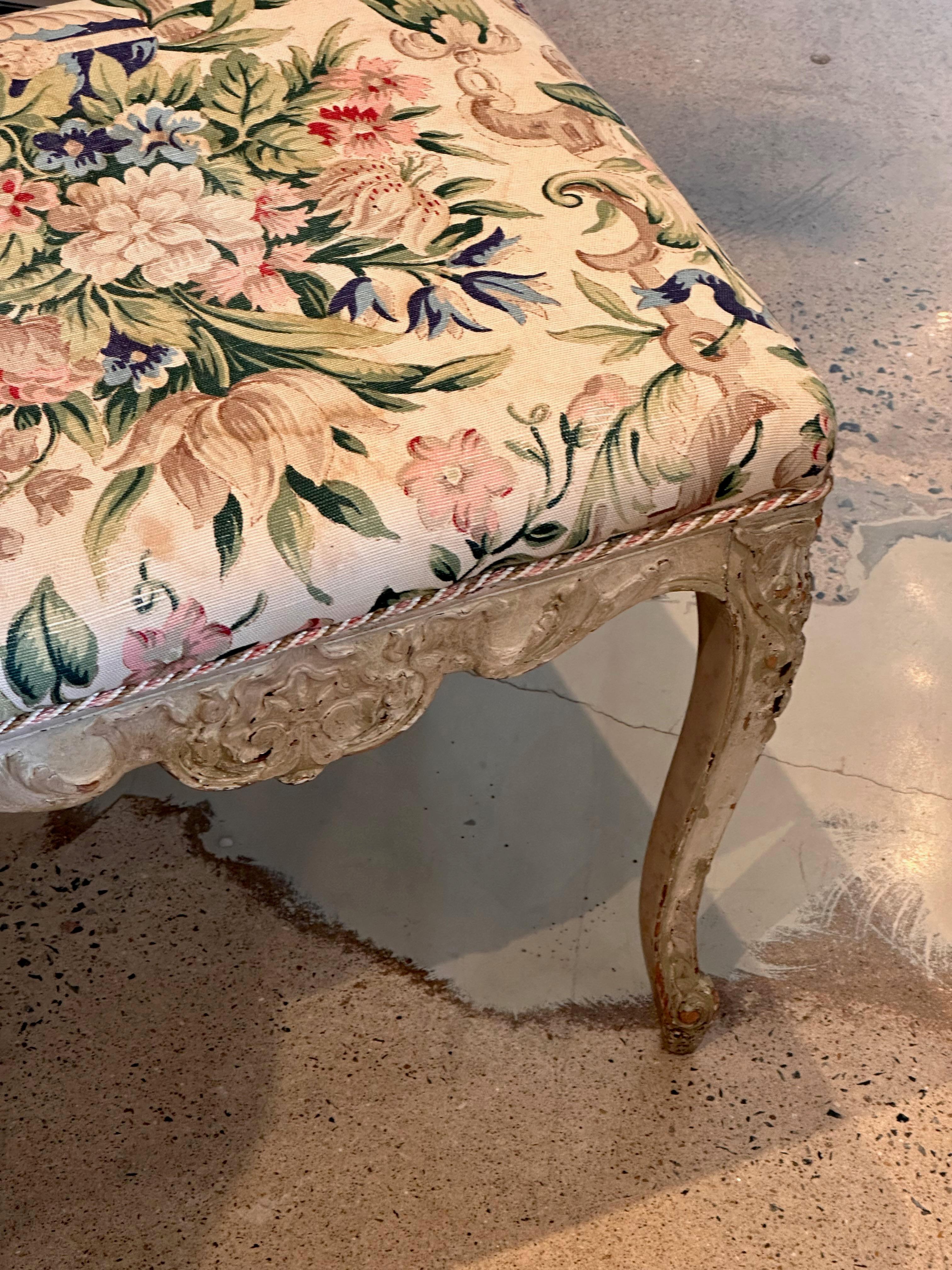 Perch yourself on this beautiful stool. Nicely carved with warm, worn paint. A great seat.