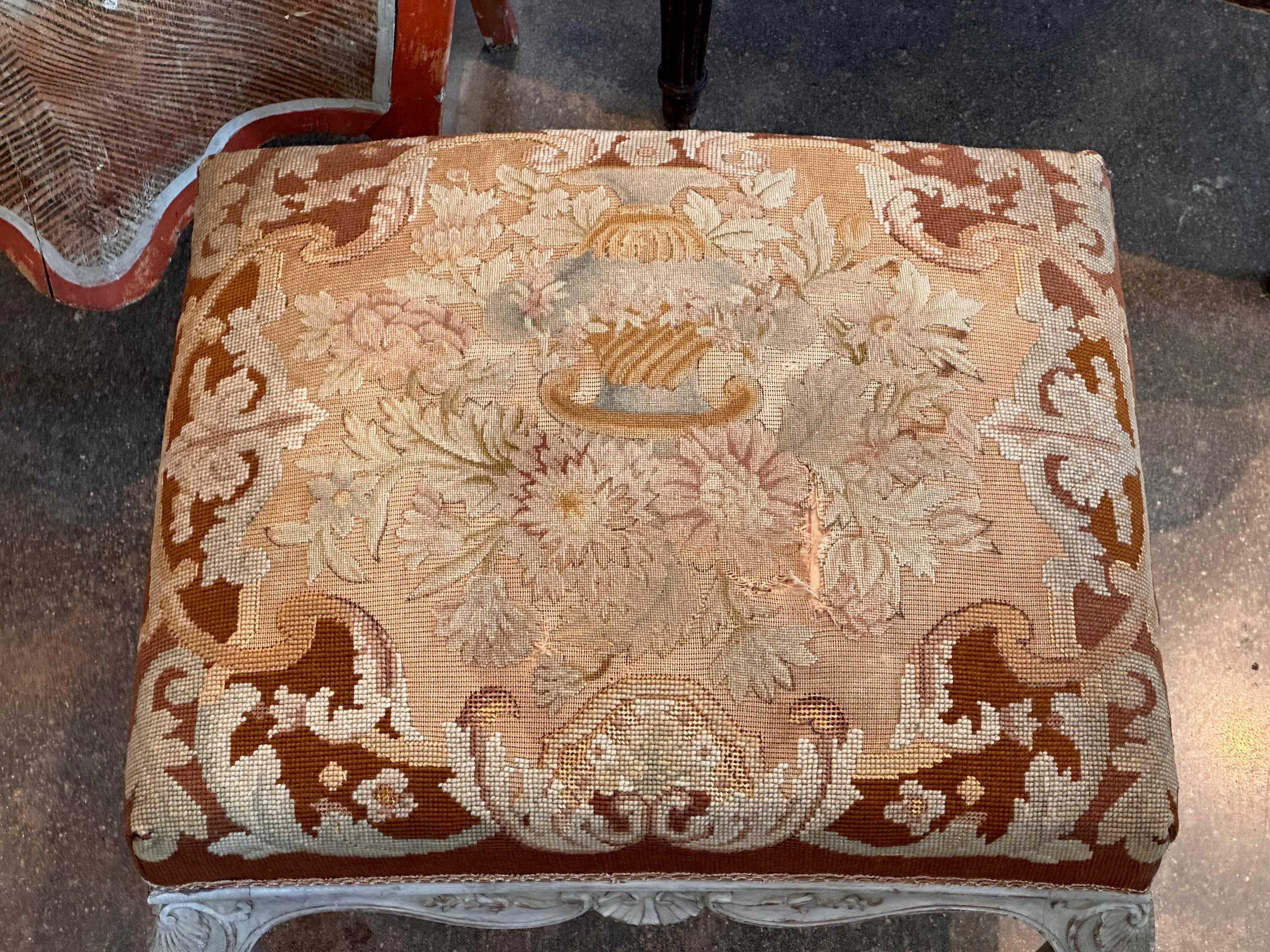 A beautiful carved and painted French Stool