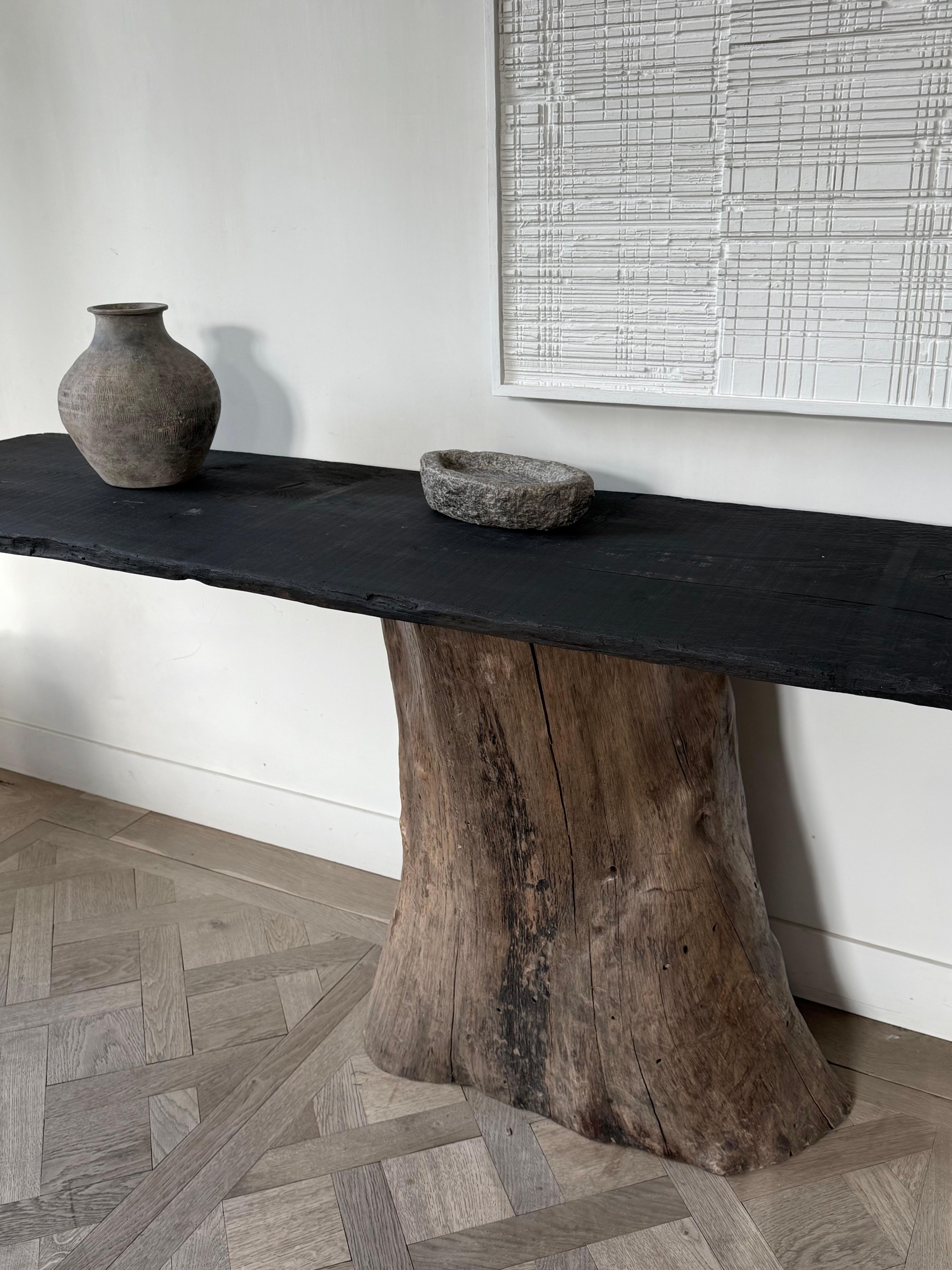 Handmade
hand-thrown Chinese pottery vase.

A 19th-century version with plenty of character.

Large, round vase with a relatively flat top and a narrow opening. Decorated with small, faded patterns around the vase. A true wabi-sabi beauty!

We ship