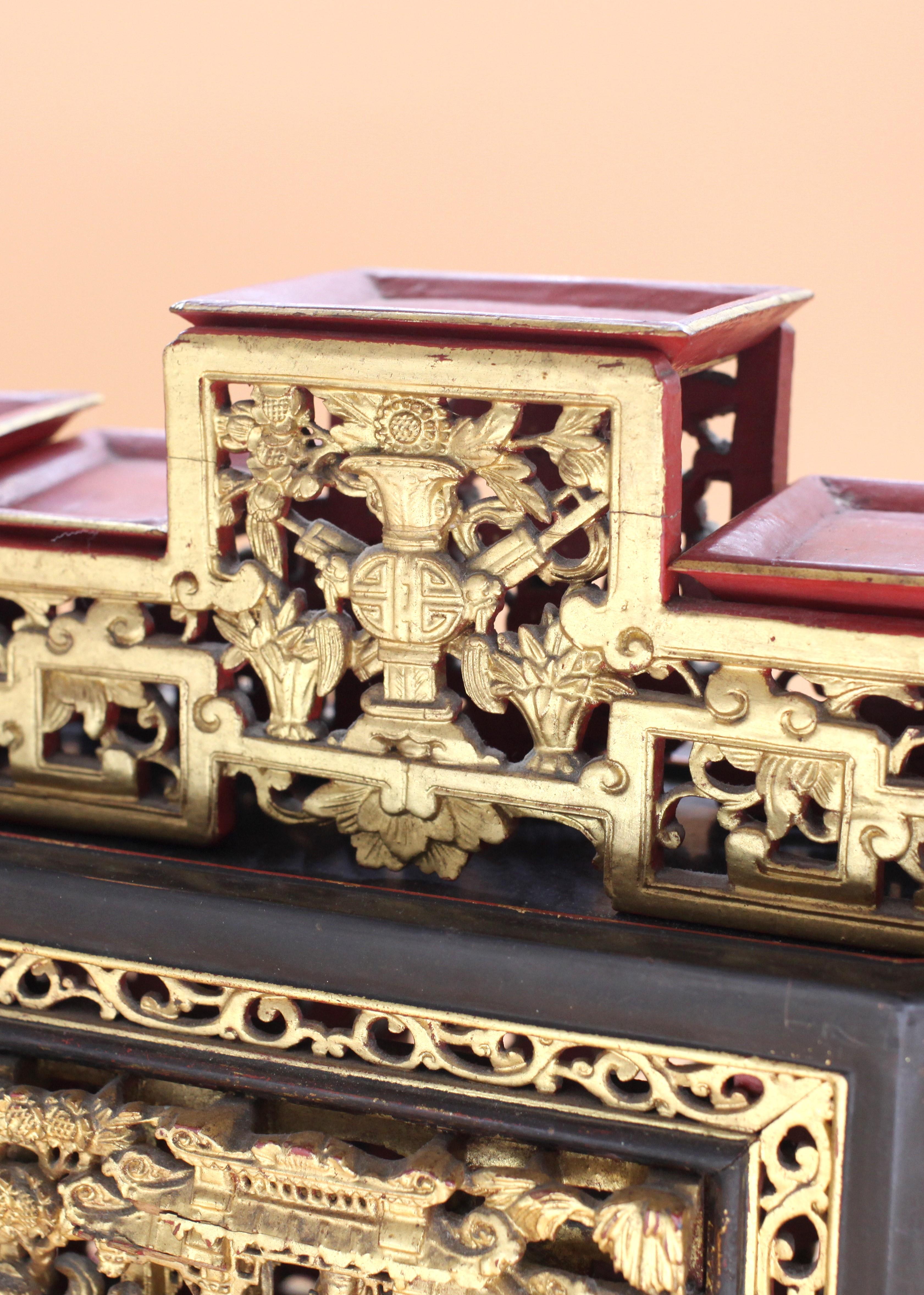 Dive into a piece of Asian craftsmanship with this 19th Century Straits Chinese Chanab. Composed of lacquered and gilded wood, this piece showcases the intricate detailing the Straits Chinese were known for. The provenance of the piece is as