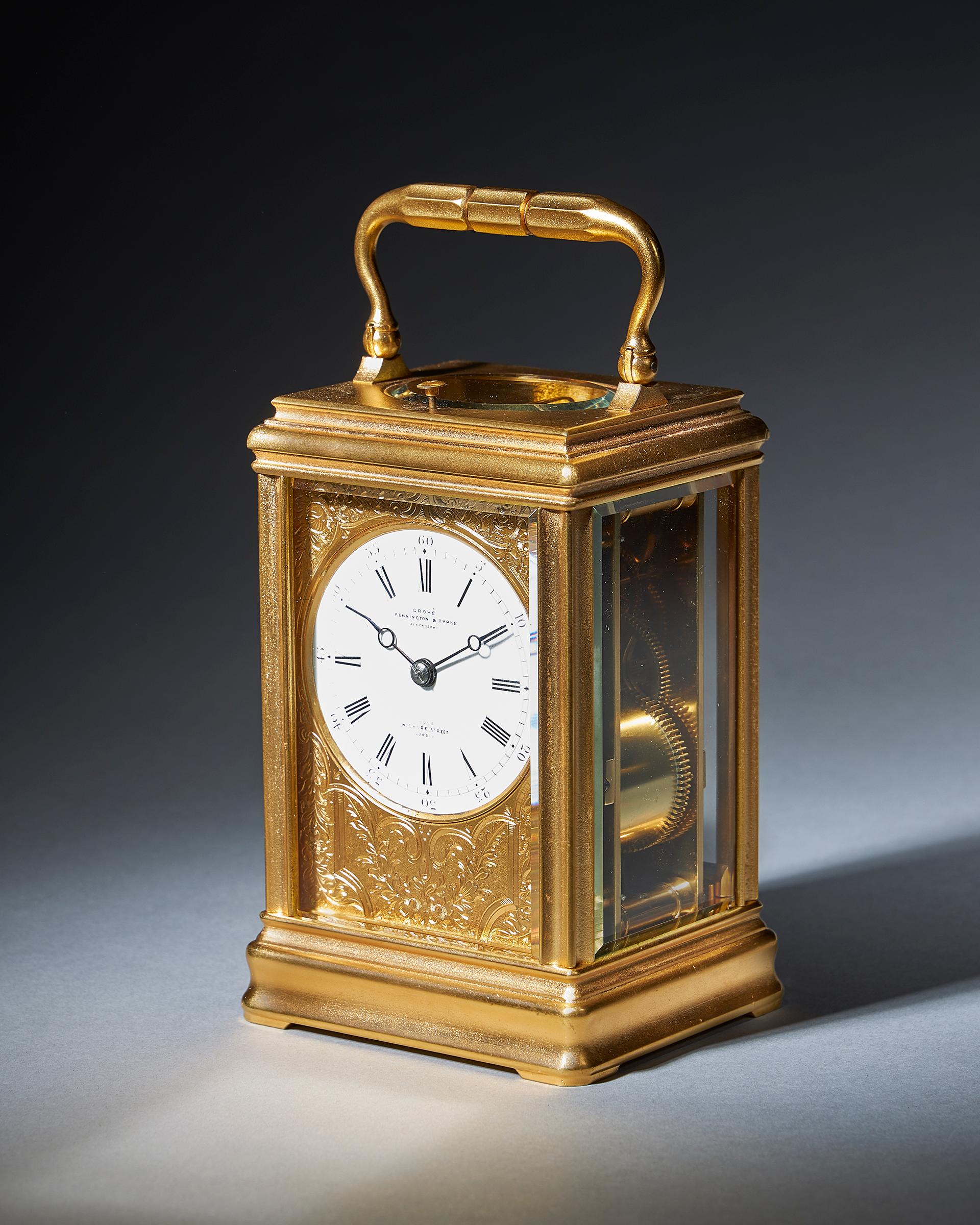 A superb repeating carriage clock with a gilt-brass gorge case by the famous maker Drocourt, circa 1870.

A lovely eight-day striking and repeating carriage clock signed and numbered by the retailer on the enamel dial, GROHÉ PENNINGTON & TYPKE