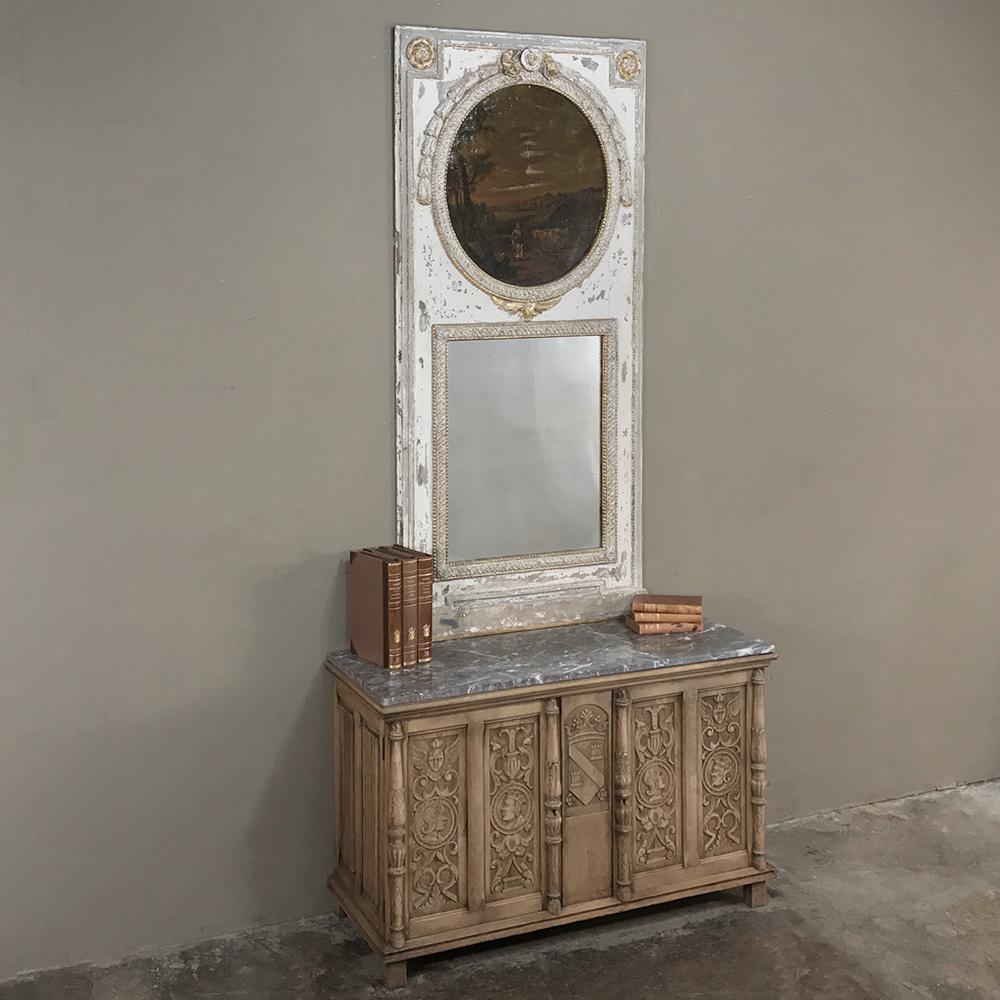 19th century stripped Renaissance Revival low buffet with marble top appears at first glance to be a trunk, but the two beautifully carved doors open to reveal surprising storage with shelves inside. Ideal as a mount for your big flat panel TV, at