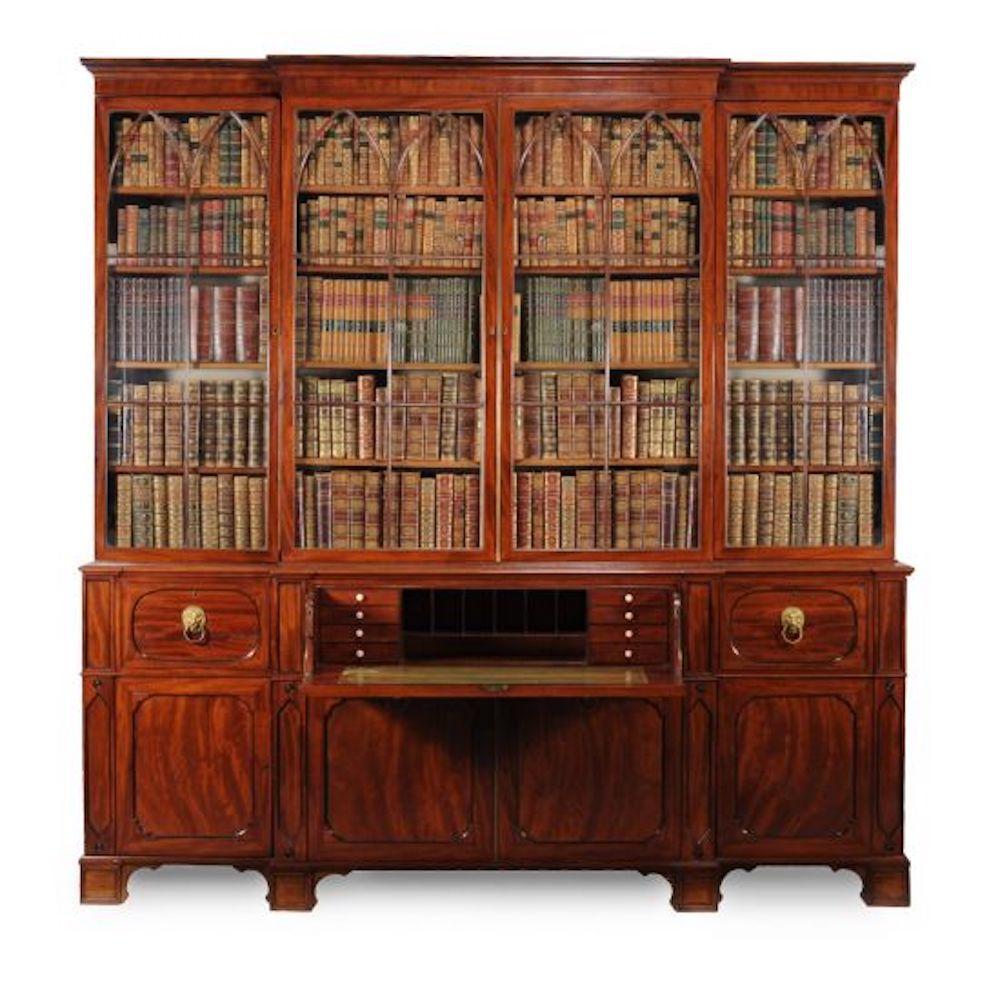 We are delighted to offer for sale this George IV period mahogany Secretaire Library bookcase, circa 1825. The moulded cornice above four astragal glazed doors opening to adjustable shelves. The lower section with central fall front secretaire
