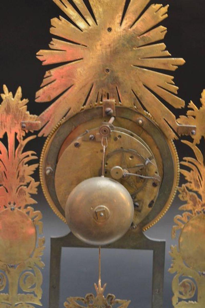Bronze 19th Century Sunburst Clock For Sale