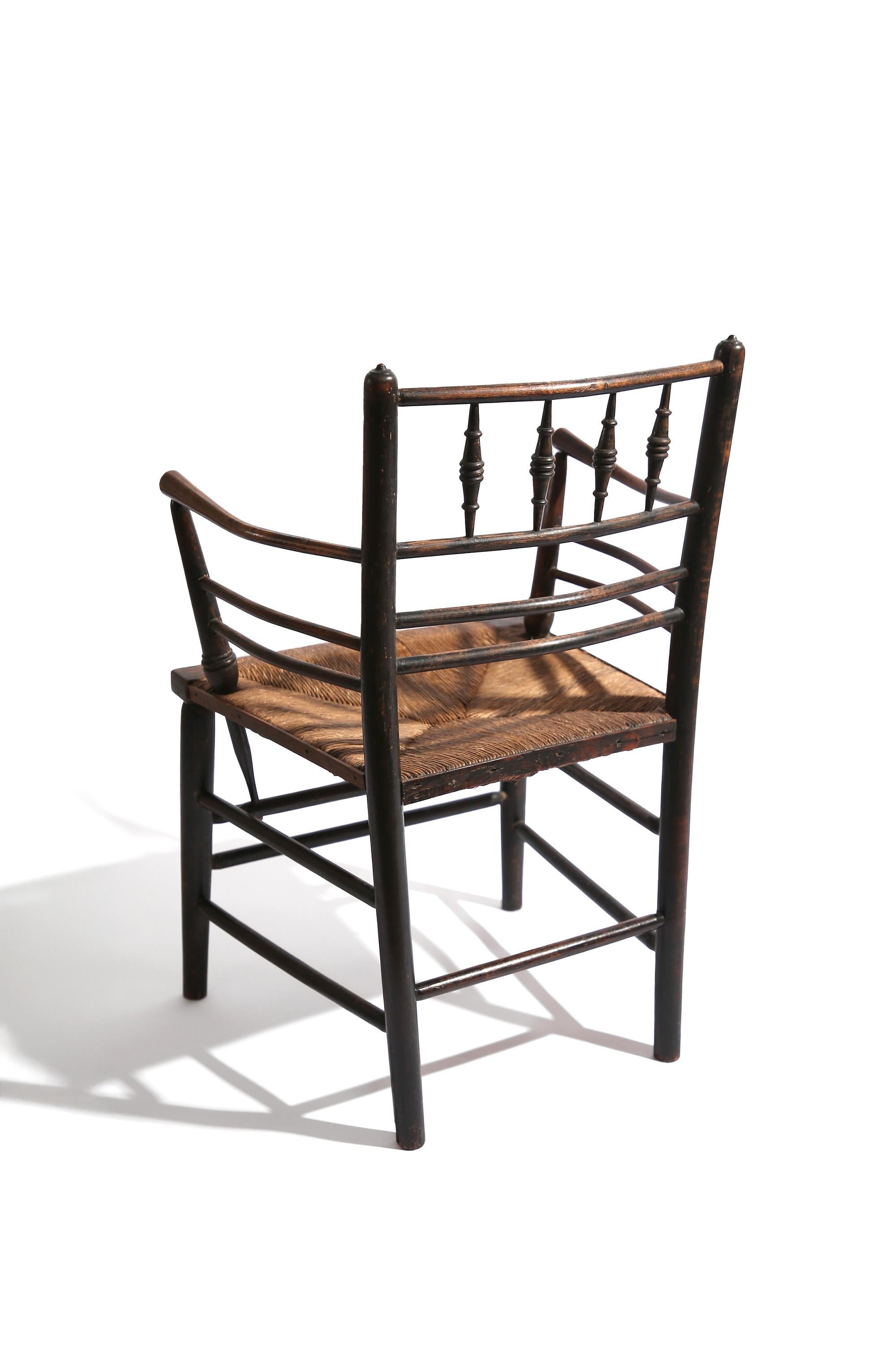 Rush 19th Century 'Sussex Chair' designed by Philip Webb for William Morris & co. For Sale