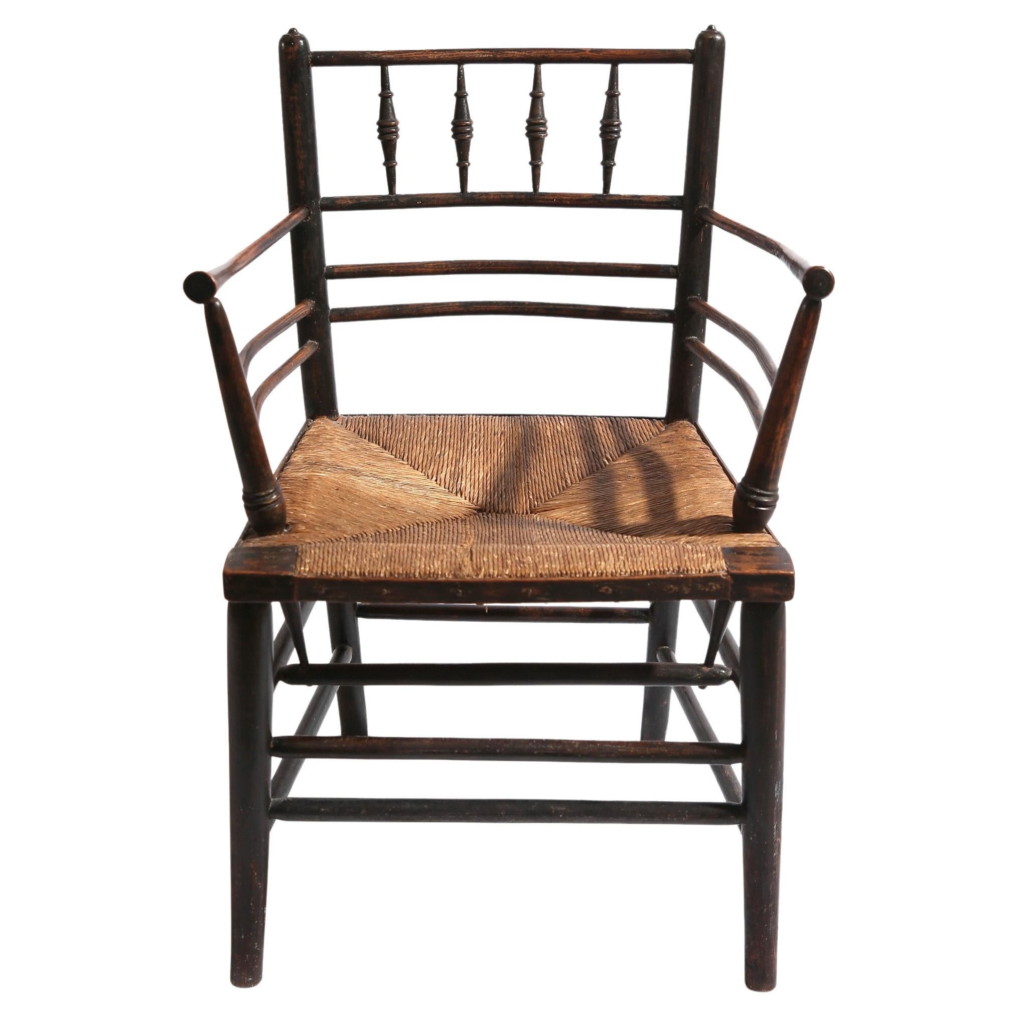 19th Century 'Sussex Chair' designed by Philip Webb for William Morris & co. For Sale