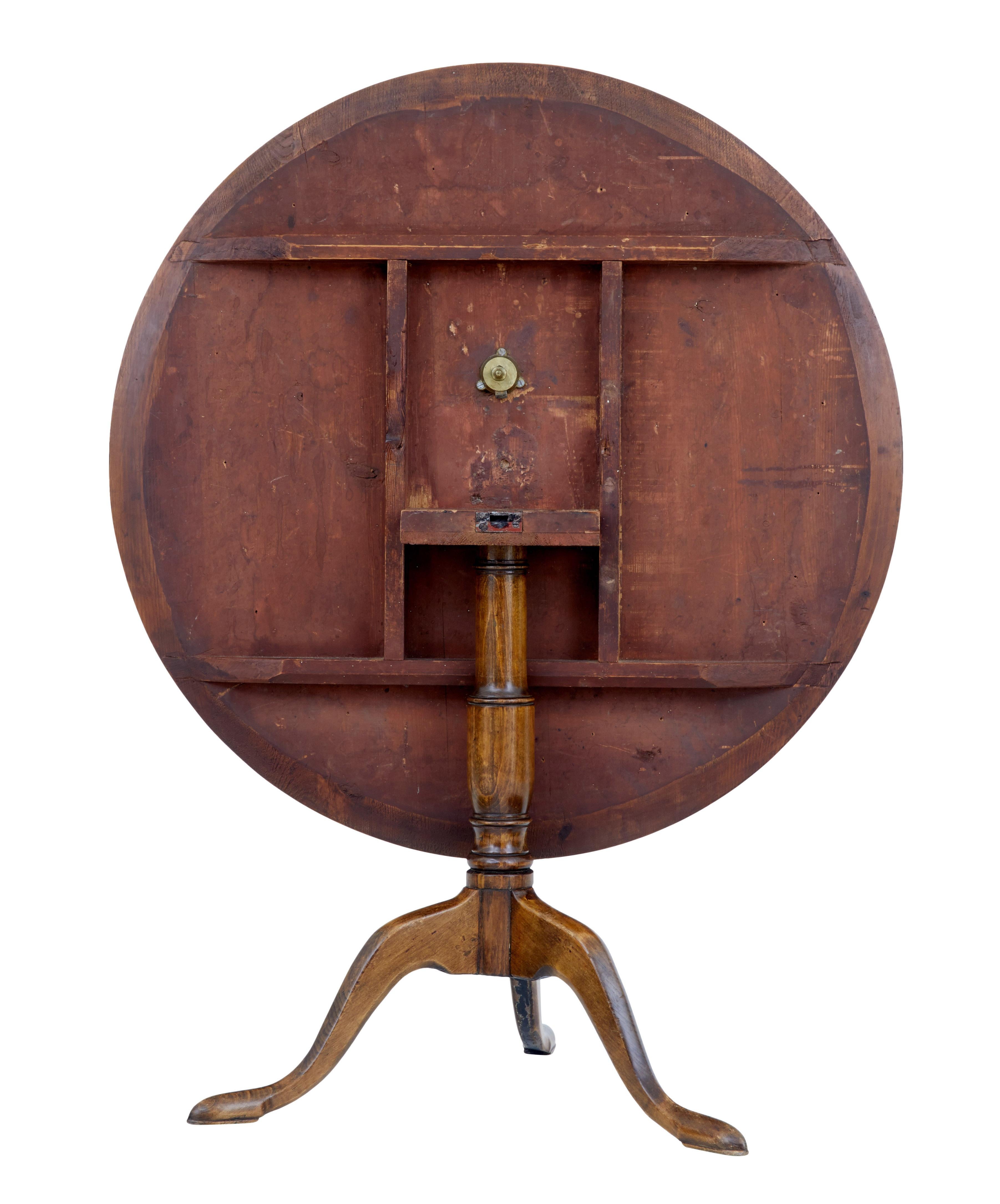 Fine quality mid-19th century Swedish tilt top table circa 1860.

Circular top beautifully veneered in striking alder root. Supported by birch turned stem and 3 legs, terminating on pad foot.

Multiple uses for this practical piece of