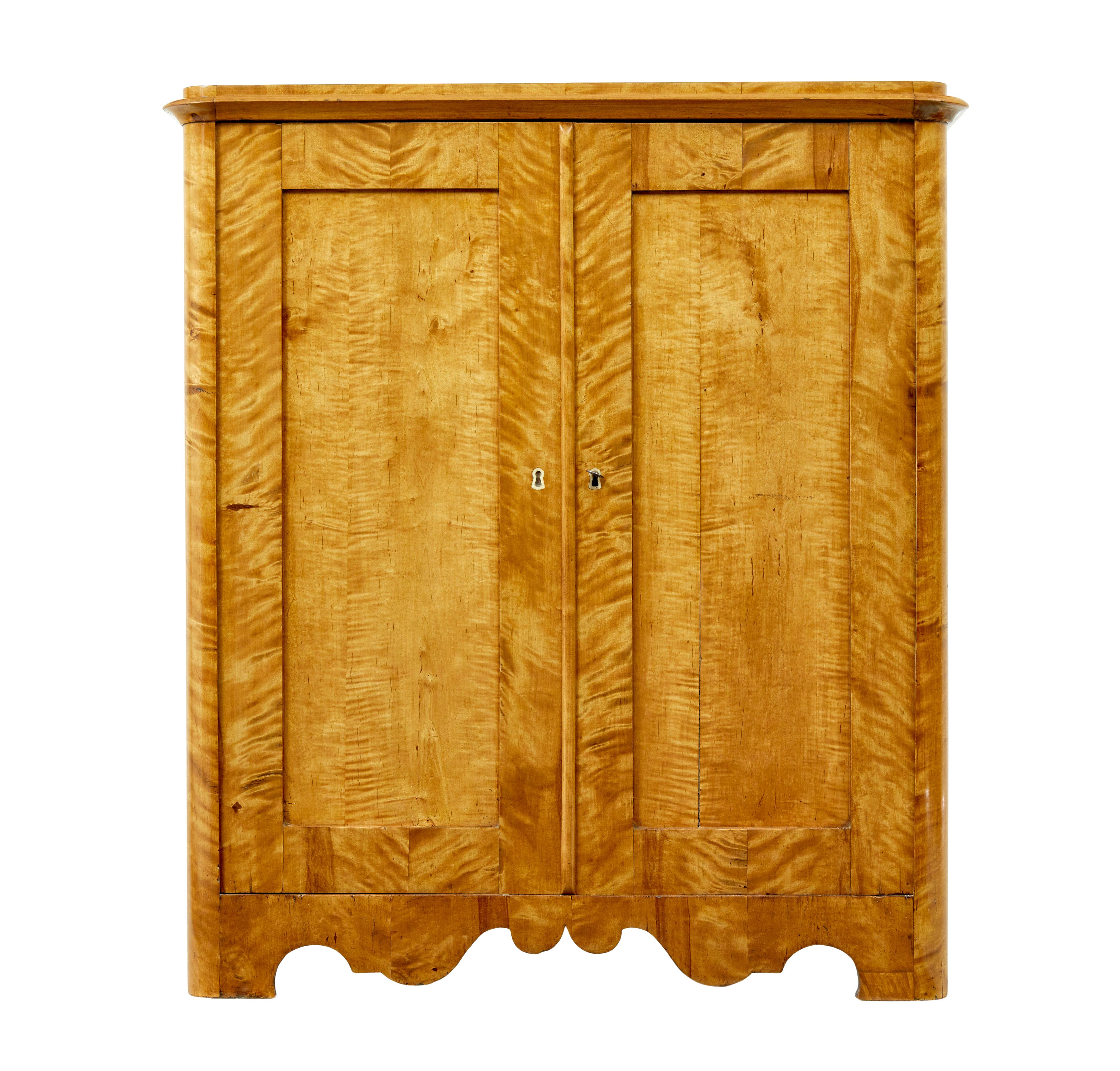 Carved 19th century Swedish birch cupboard For Sale