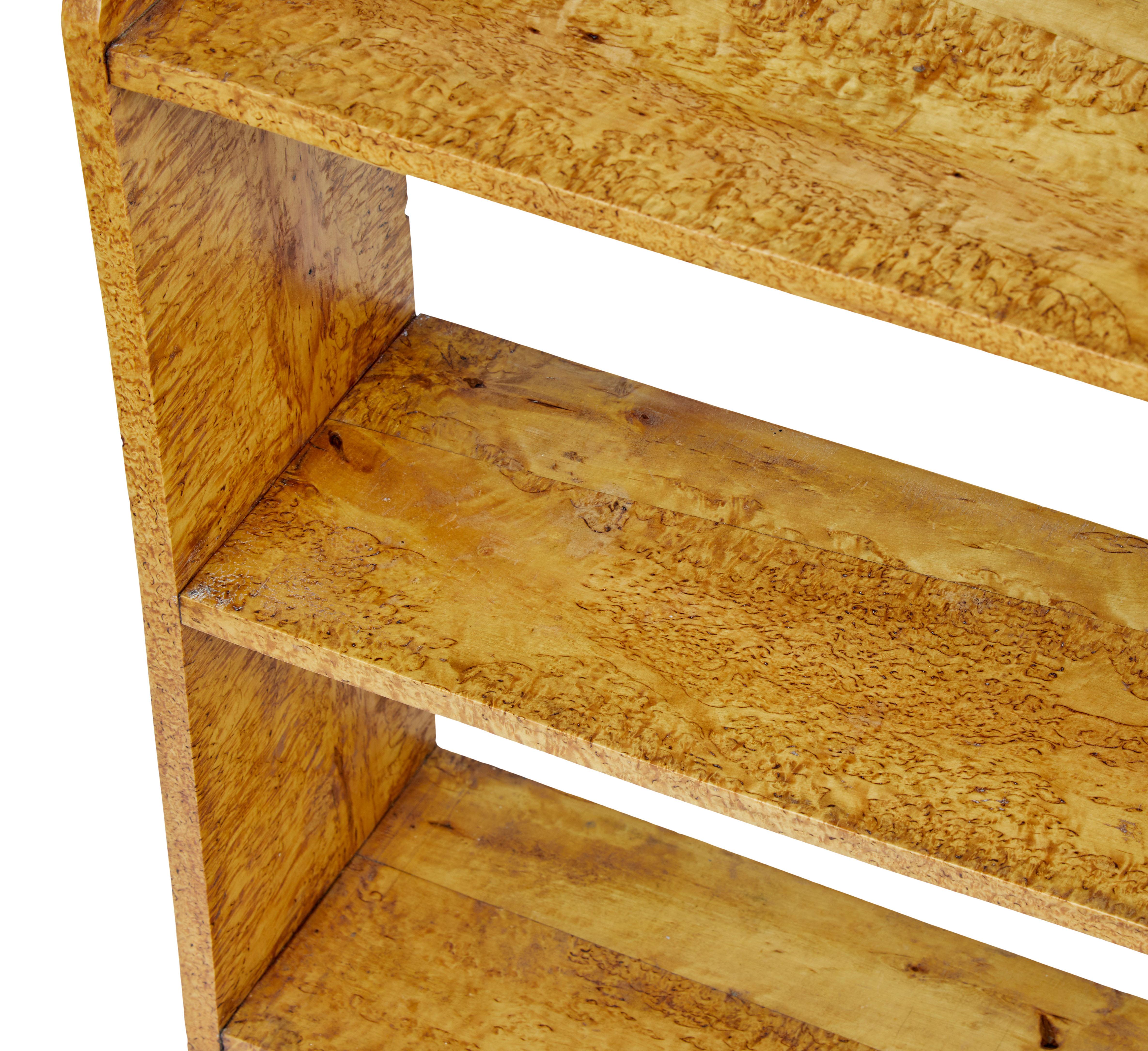 Rustic Swedish birch hanging wall shelving, circa 1870.

Unusually made in birch root with its rich color and grain. 4 shelves.

Ideal in the kitchen or hallway.

Some natural warping to wood, structurally sound.