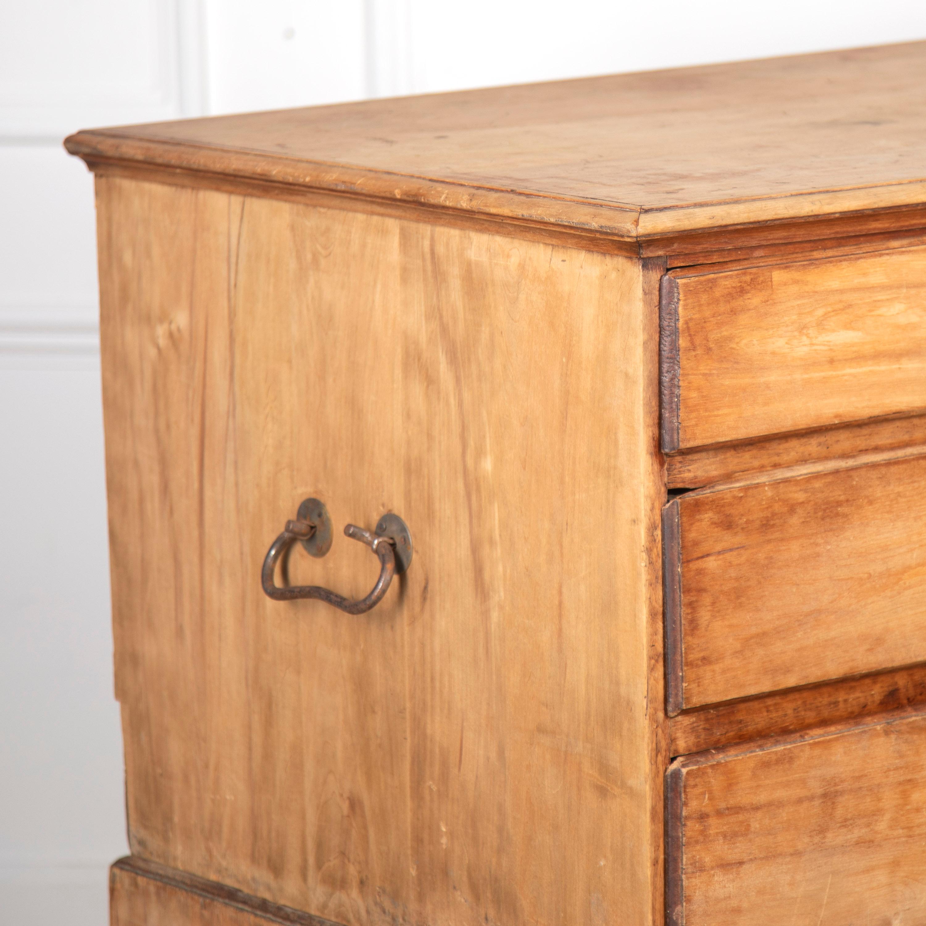 Early 19th century Swedish box on chest. 

This chest of drawers is in very good condition, retaining its original handles to both sides, and elegant bracket feet. The whole has been taken back to its original form and graining.

Featuring
