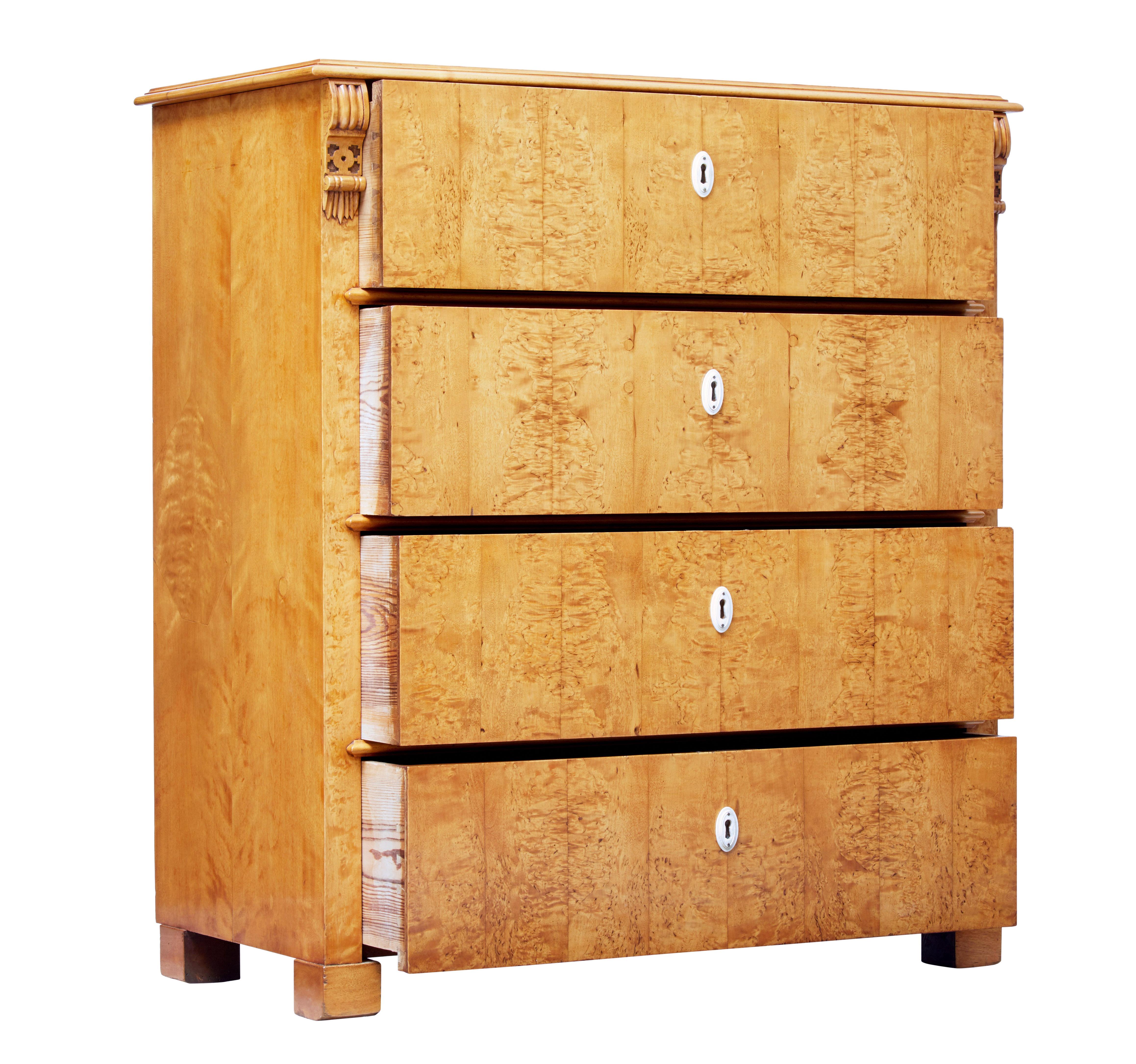 19th century swedish birch root chest of drawers circa 1880.

4 equal proportioned drawers, each veneered in birch root.  Typical with scandinavian furniture of this period in that the drawers open on the key and have no handles.  Handles could be