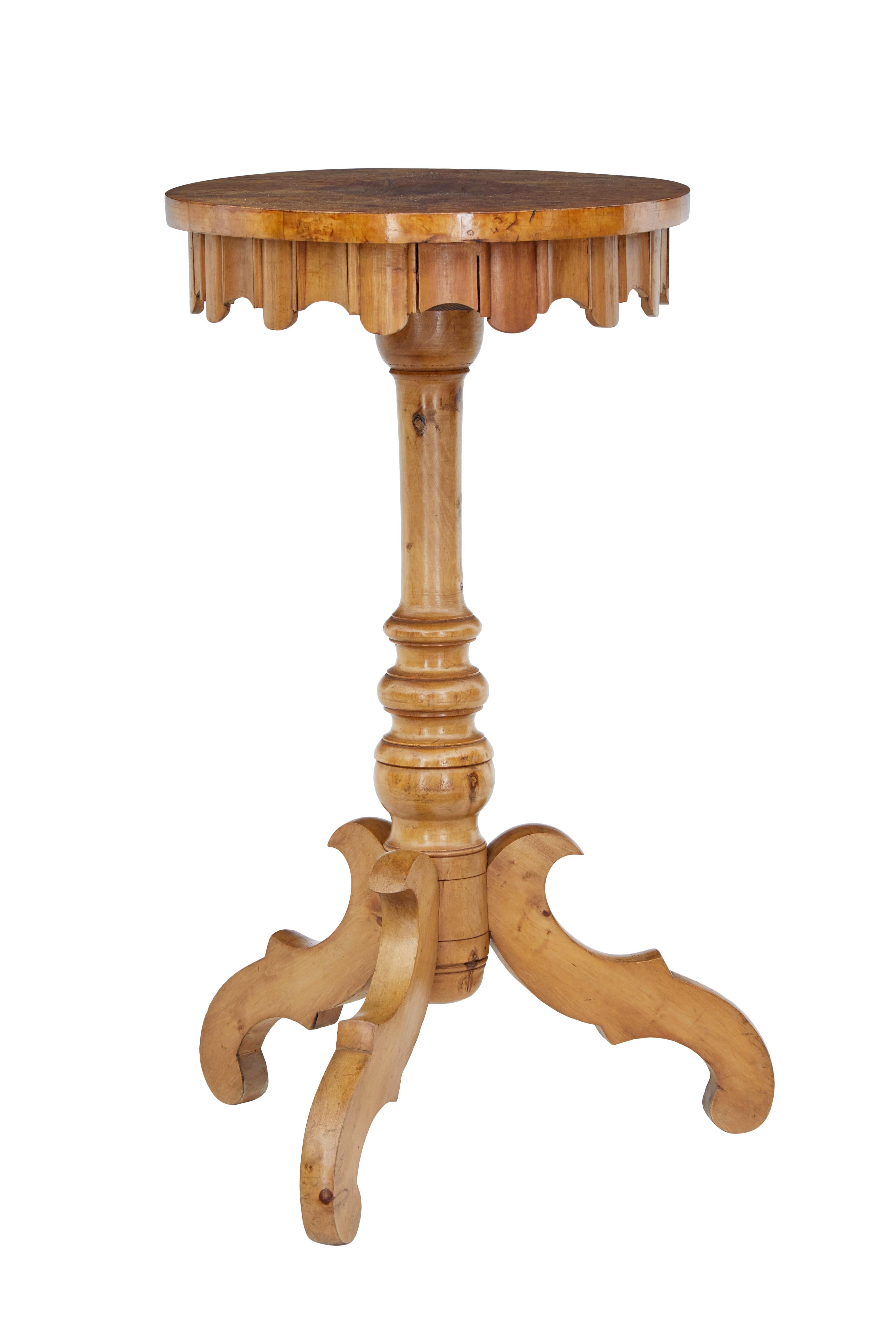 Oval Swedish occasional table, circa 1880.

Burr birch oval top with central elm veneered diamond, with scalloped frieze.

Standing on a turned stem with 3 scrolled legs.

Minor surface marks and light fading.