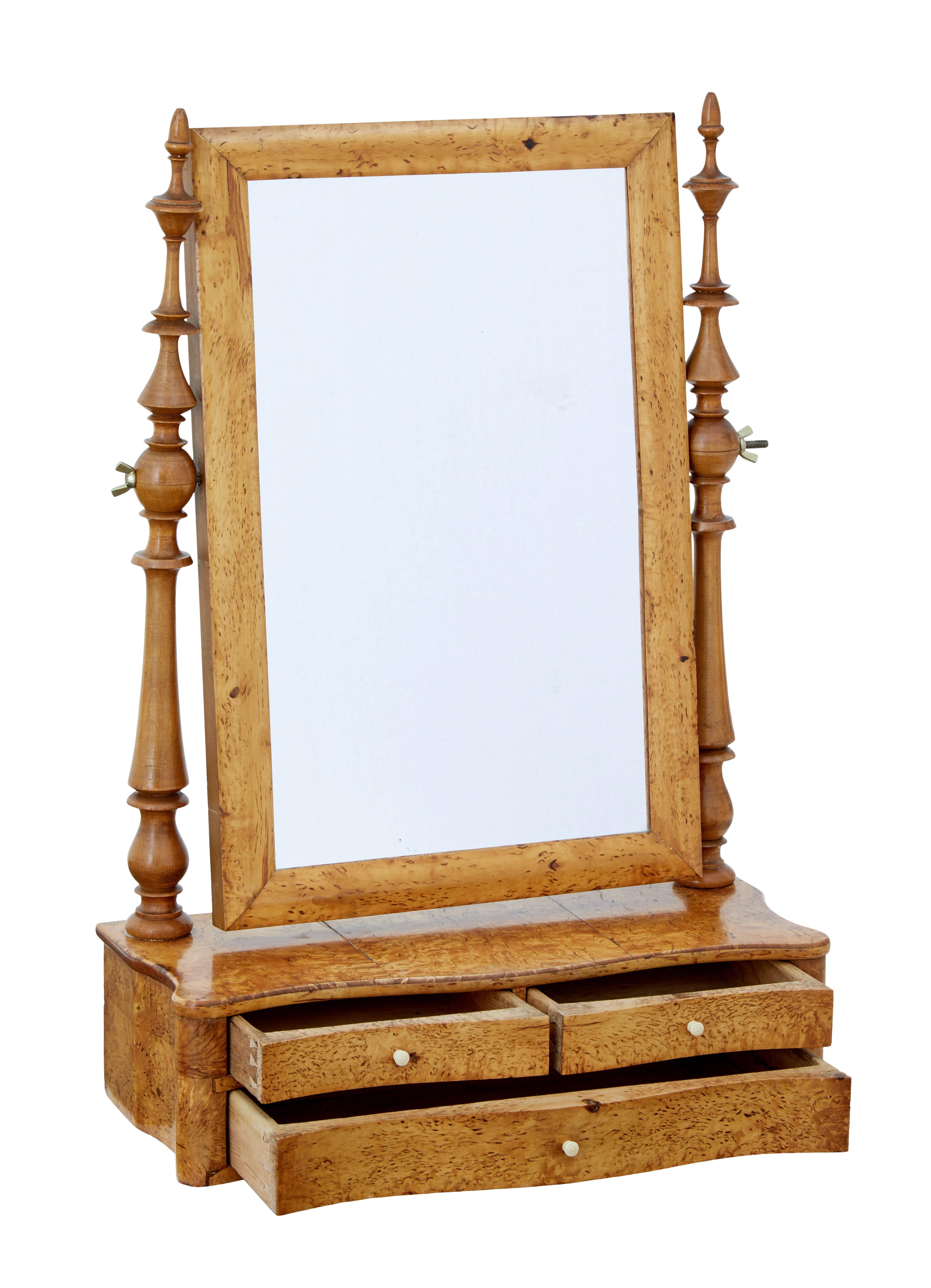 Good quality dressing table vanity mirror circa 1880.

Burr birch rectangular frame held in place by turned supports, standing on a burr birch base of 2 over 1 drawers. Rich golden color which really makes the burr veneer come alive.

Minor