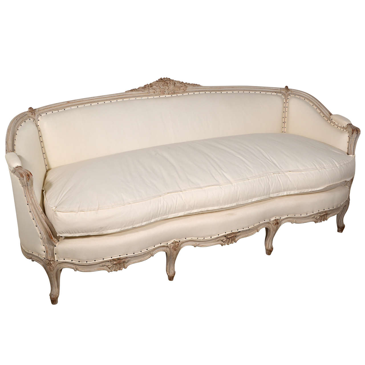 19th century Swedish canapé sofa: beautifully carved, gray painted sofa adorned with exceptional foliate motif decoration. Newly upholstered with down-wrap cushion.

Note: Regional differences in humidity and climate during shipping may cause