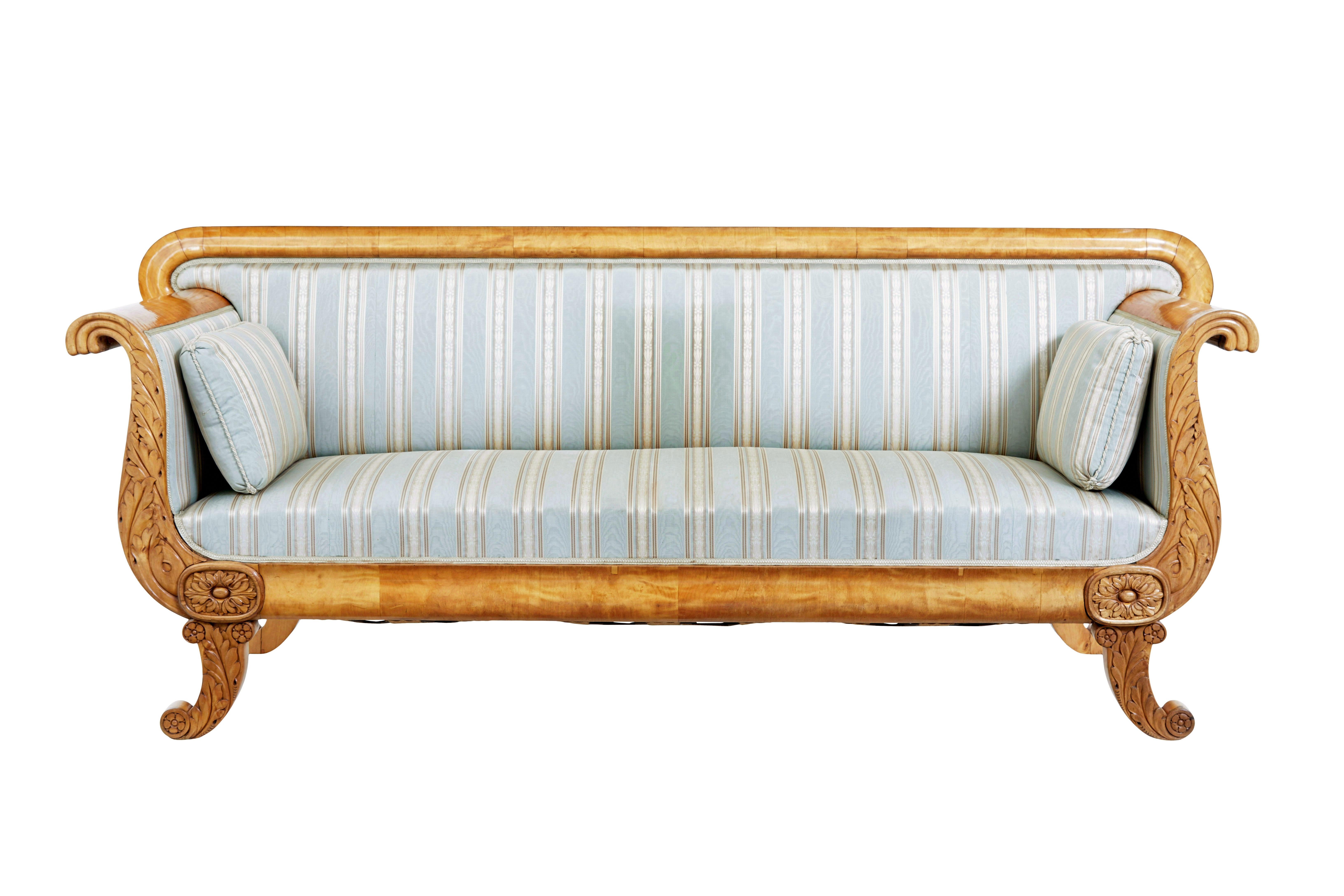 19th century swedish carved birch sofa circa 1880.

Elegant swedish formal sofa which seats a comfortable 3.  Straight back with shaped birch border.  Roll top arms with carved acanthus leaf detailing flowing down to the applied carved plaque above