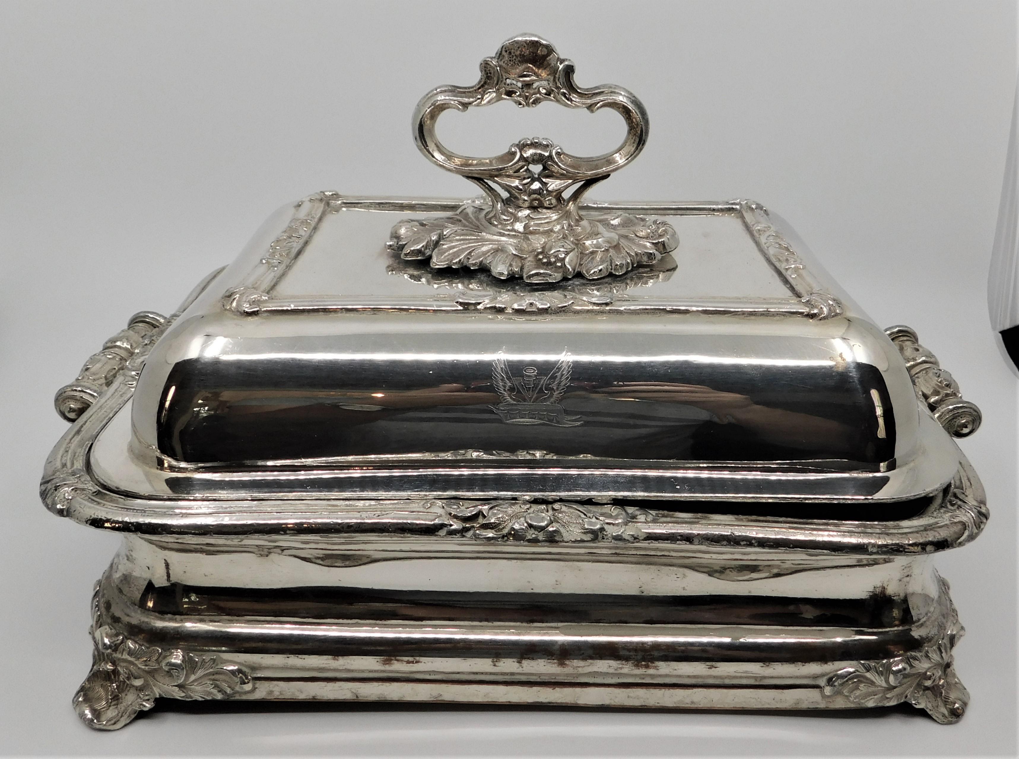 Pair of beautiful antique Sheffield silver-plated entree serving tureens, made circa 1820. Each piece are have three parts with a detachable beautifully ornate handle on lids, which allows for easy washing and storage. Claw feet. In very good