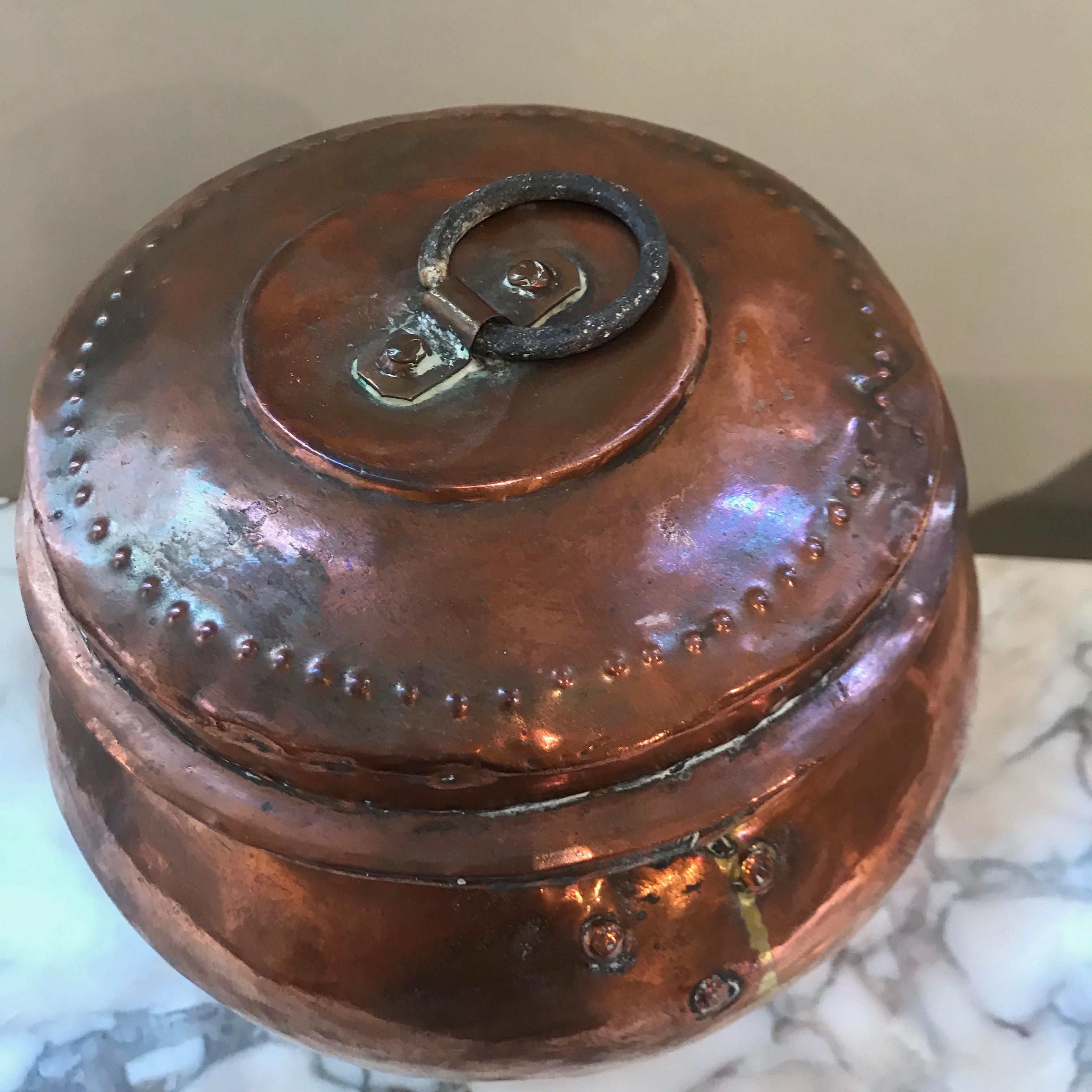 Very decorative Swedish copper covered urn with ring handle. Elegant undulating classical urn shape with the rustic quality of copper kitchenware of the north of Sweden.