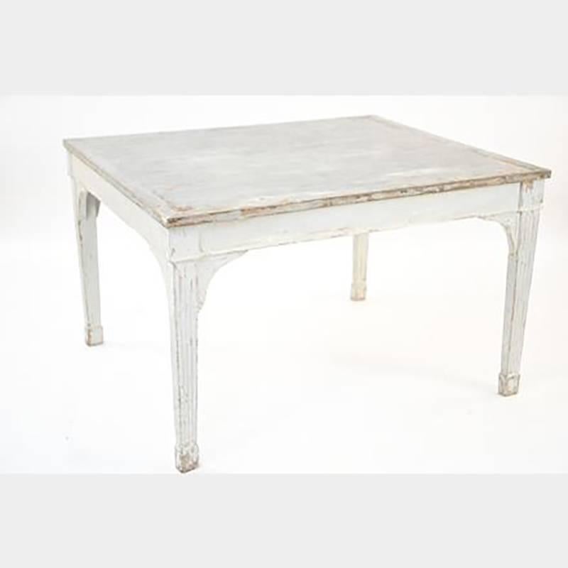 Gorgeous 19th century Swedish dining table. Consists of one rectangular table and two demilunes. Scratches and wear to wood and carved detailing present. Wear consistent with age and use. Paint loss. Surface wear, nicks, and dings. Some separation