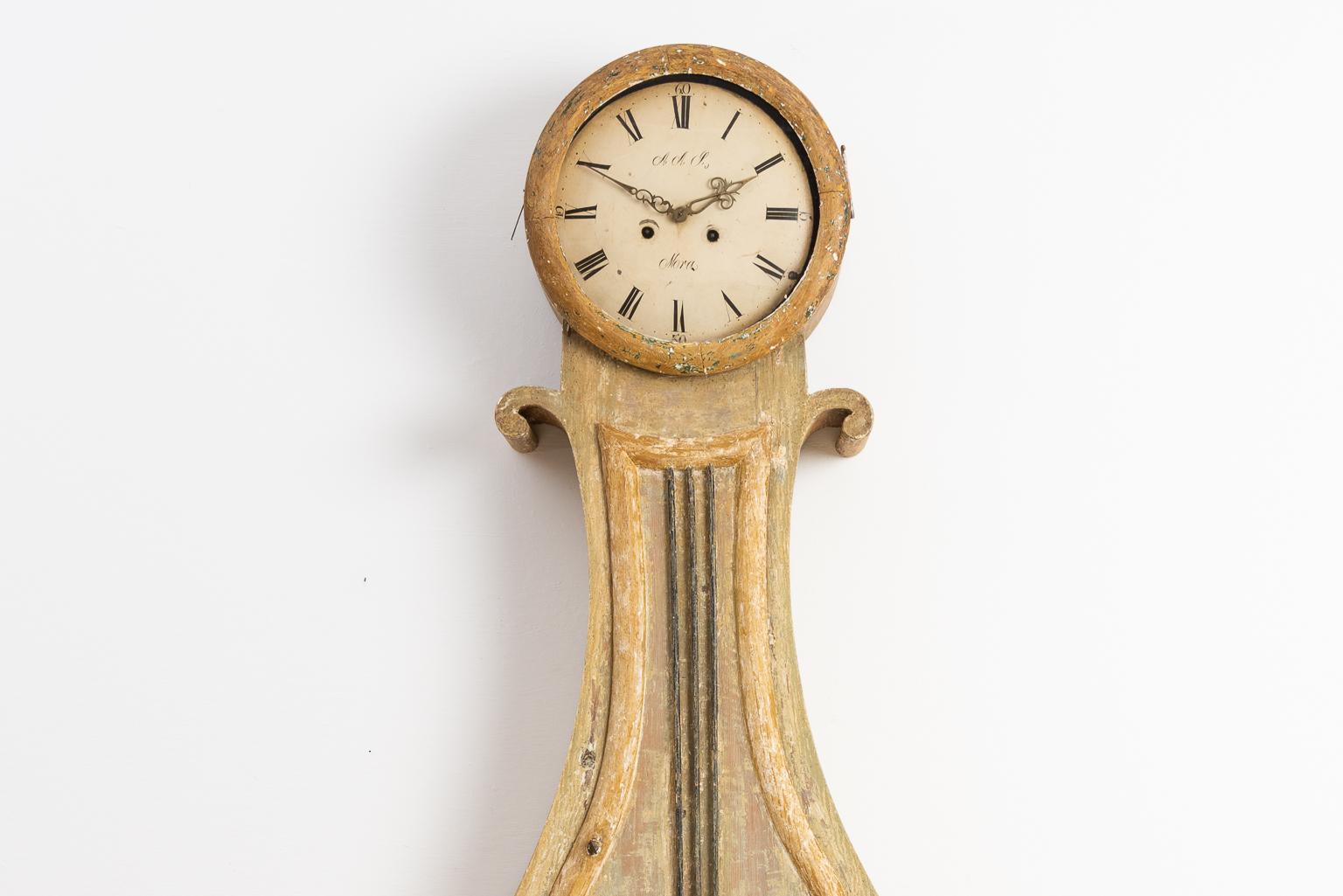 Swedish mora clock in Empire style from circa 1820. The clock is dry scraped to the original paint

The clock comes with the original clockwork, two iron weights and pendulum. The clockwork has not been serviced and is sold as found.