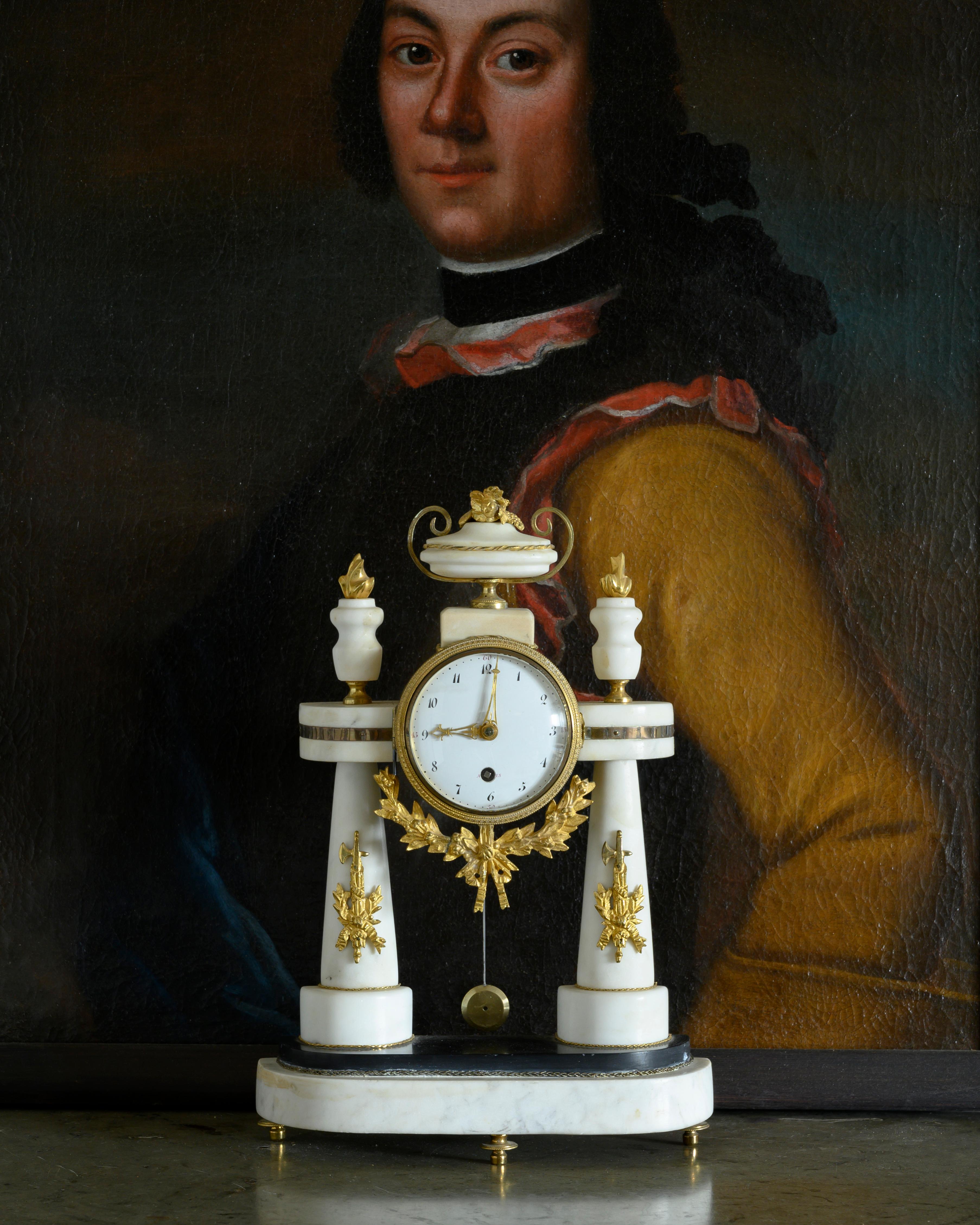 Fine 19th century Swedish Empire bronze gilded marble table clock, circa 1820, Sweden.

The condition is good and in working order.