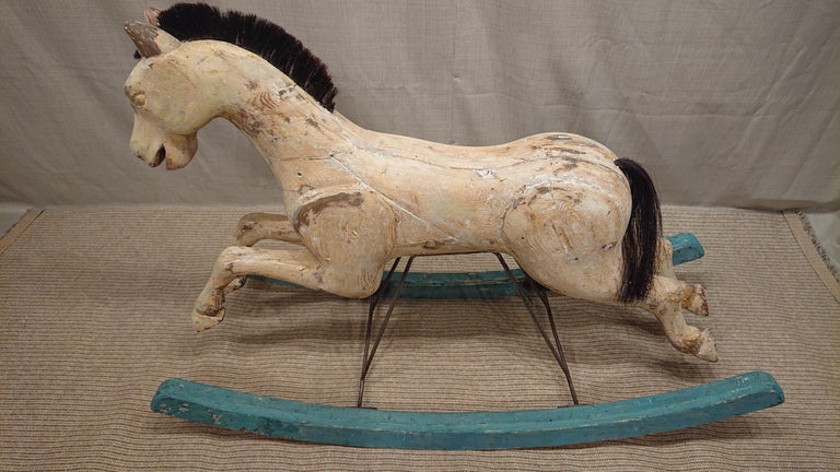 19th Century Swedish antique Rocking Horse from Boden Norrbottern,Northern Sweden.
A very charming horse with trace of original paint.
The tail and mane are made of real horse hair.
The horse is stable in construction.
Made in painted pine.