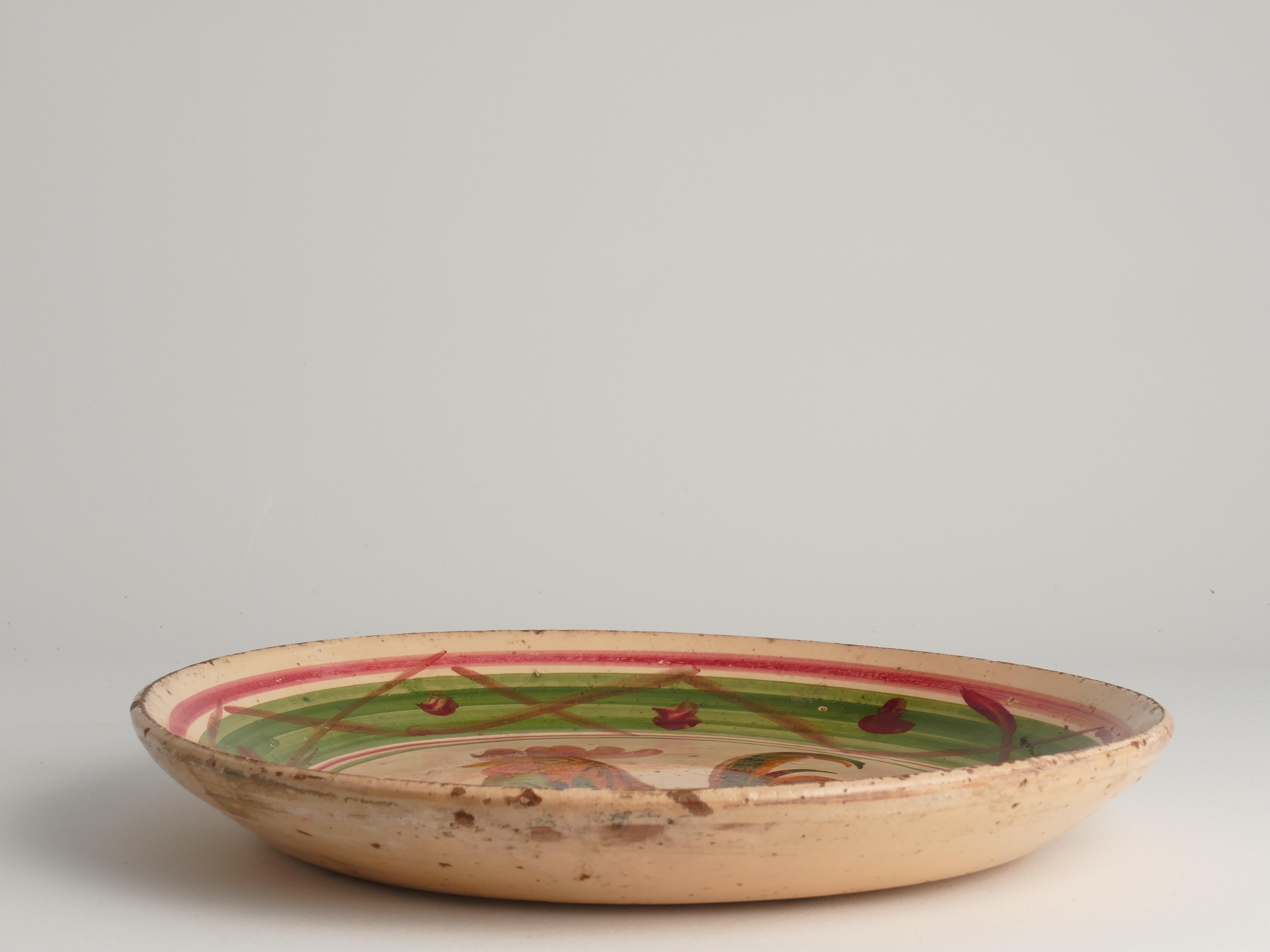 Stoneware 19th Century Swedish Folk Art Milk Bowl with Rooster Motif in Red, Green, and Br For Sale