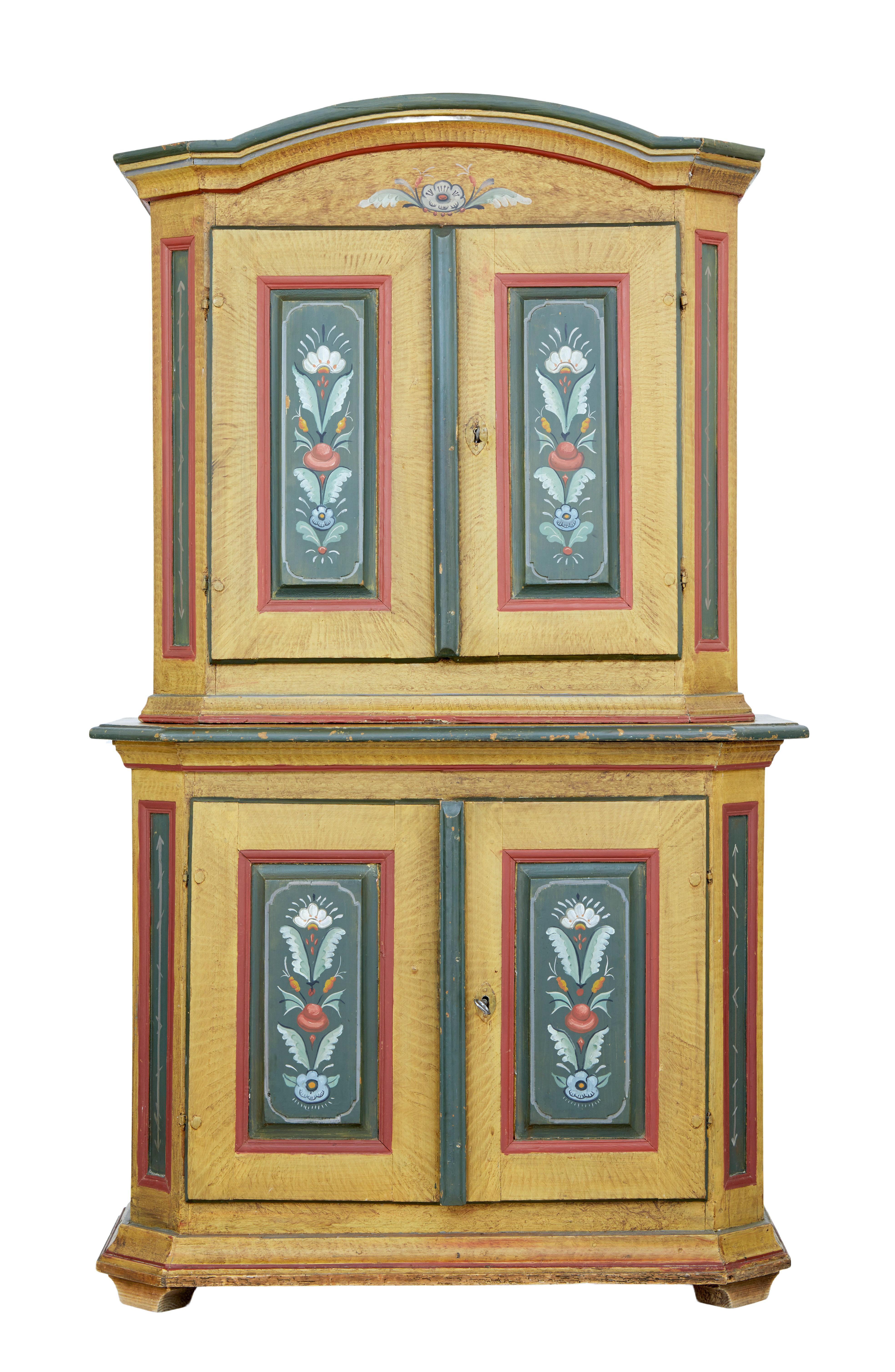 Fine piece of traditional hand painted Swedish furniture circa 1860.

2 part piece of rustic Swedish cabinet work. Top section with double doors which open to a plate rack and 2 fixed position shelves. Bottom section with a further 2 fixed