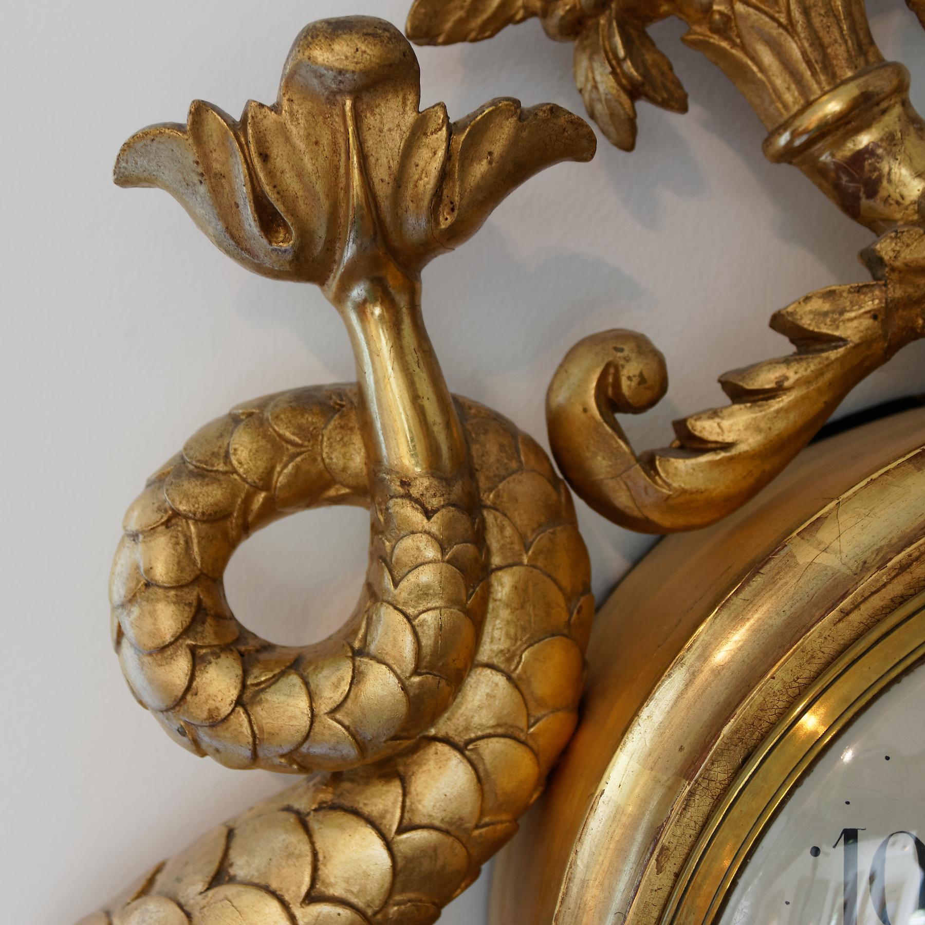 Carved 19th Century Swedish Gilded Wall Clock with Dolphins, Signed Ericsson Stockholm For Sale