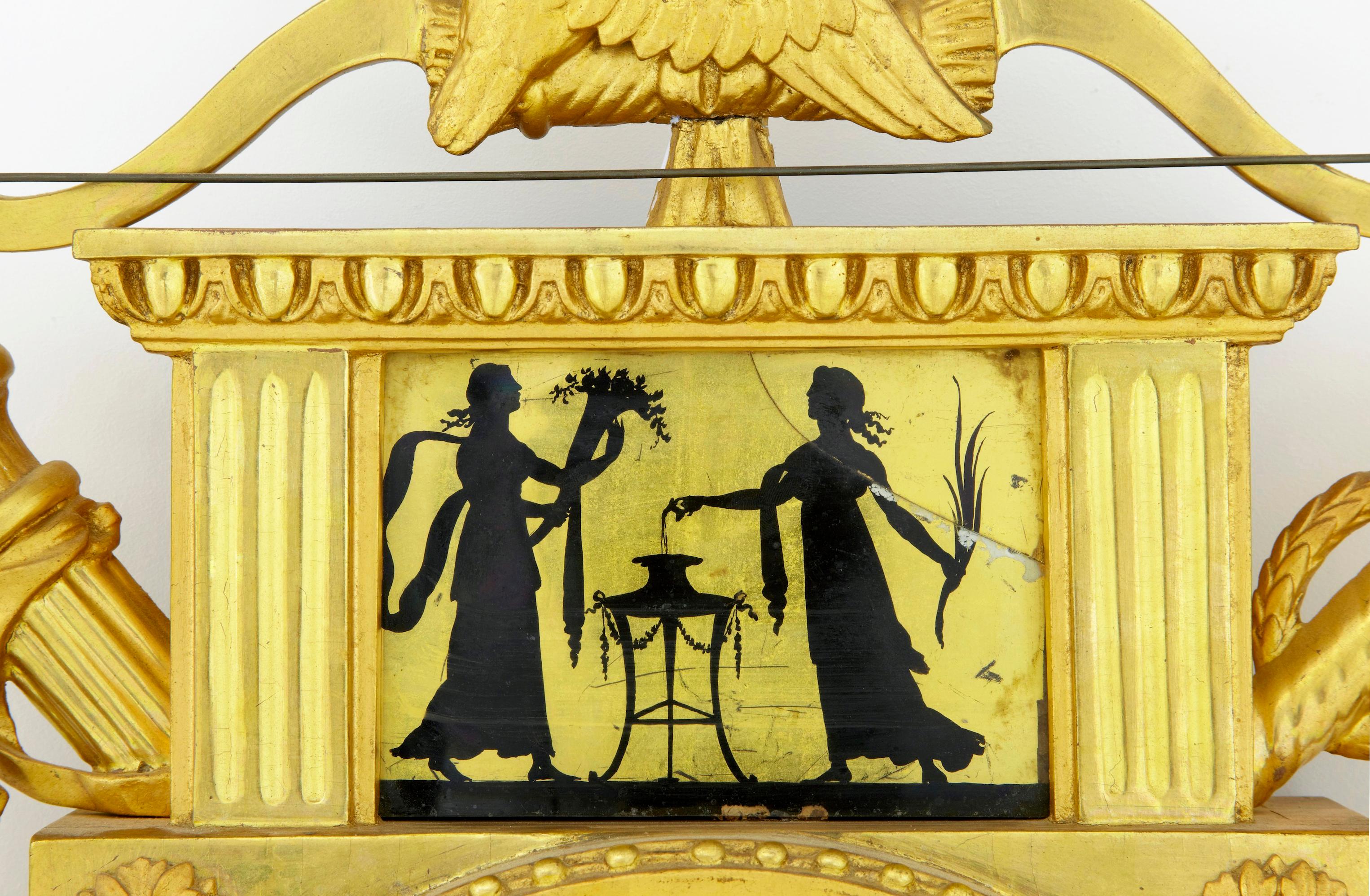 Empire 19th century Swedish gilt and eglomise ornate wall clock For Sale
