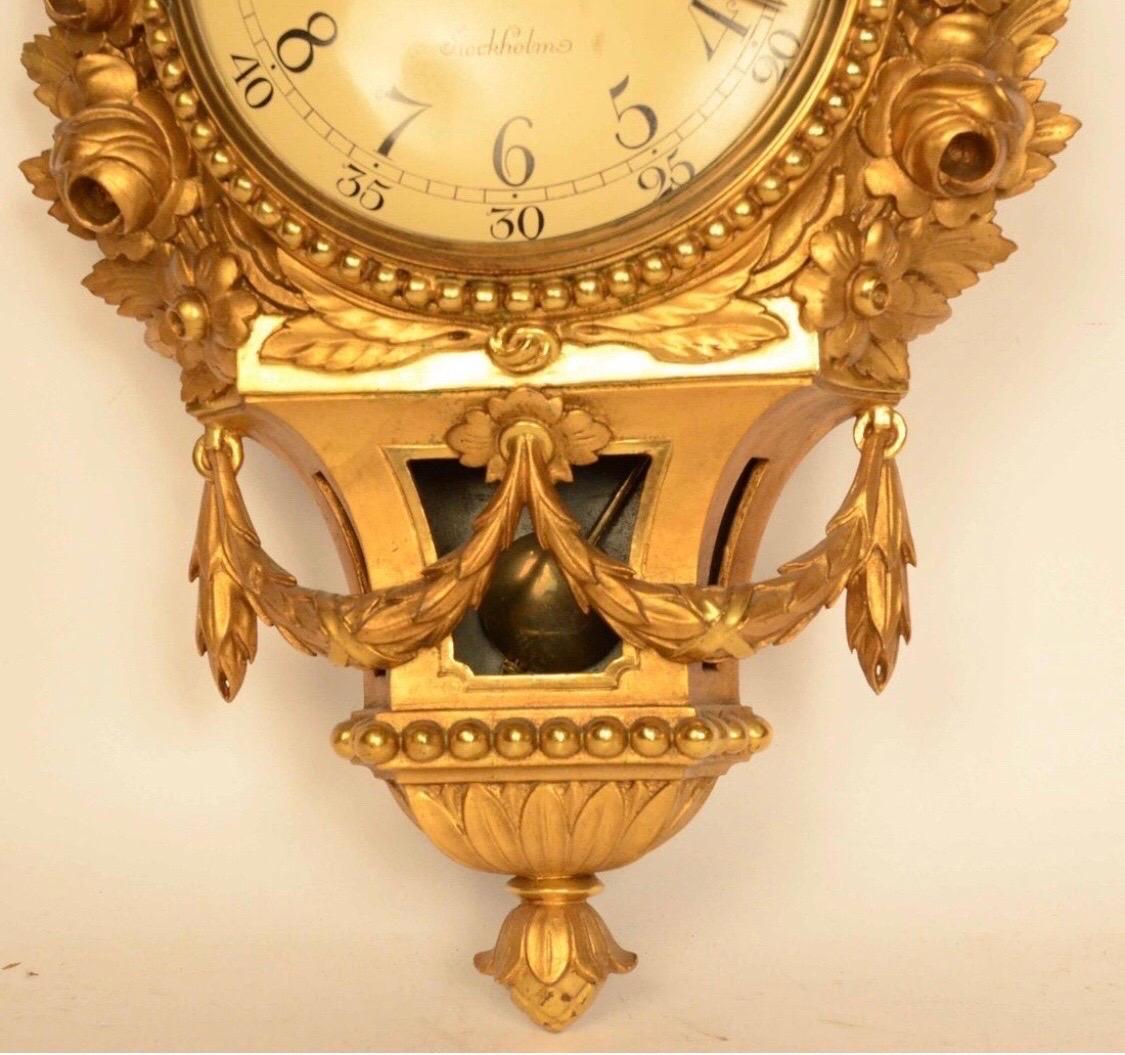 19th century Swedish giltwood cartel clock by Rob Engstrom, clockmaker founded in Stockholm in 1832.