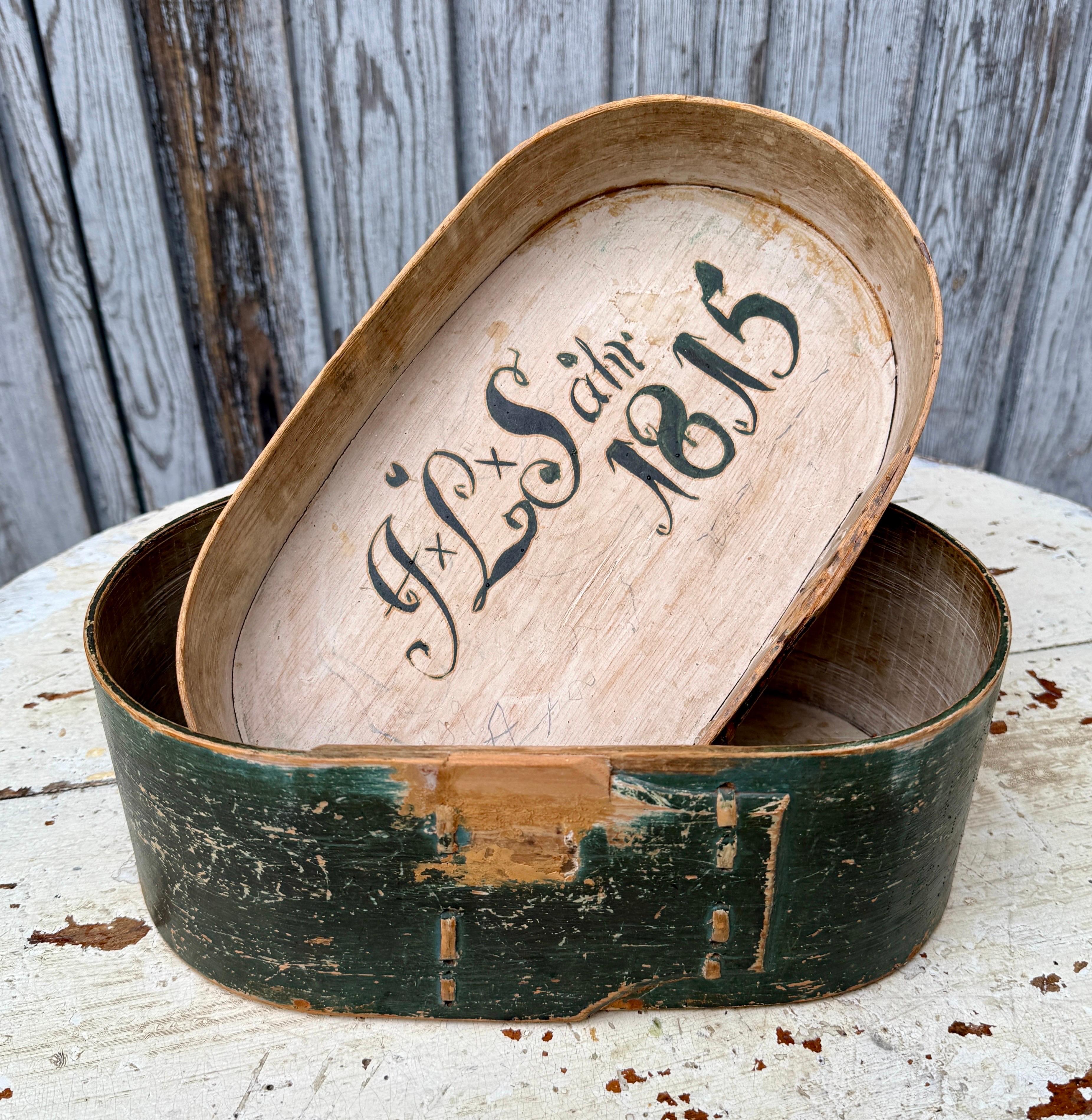 A Swedish original green painted and carved bentwood box from the Gustavian Folk Art period. These small 19th Century Scandinavian collectibles were usually hand crafted and sometimes painted, to keep personal small objects and simple (but precious